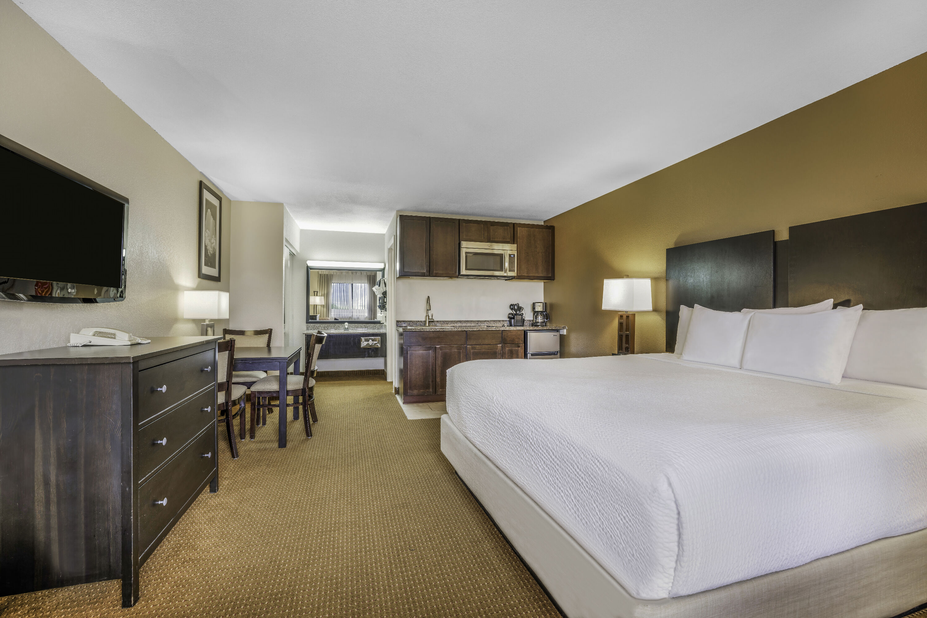 King bed guest room at the Baymont by Wyndham Cortez in Cortez, Colorado