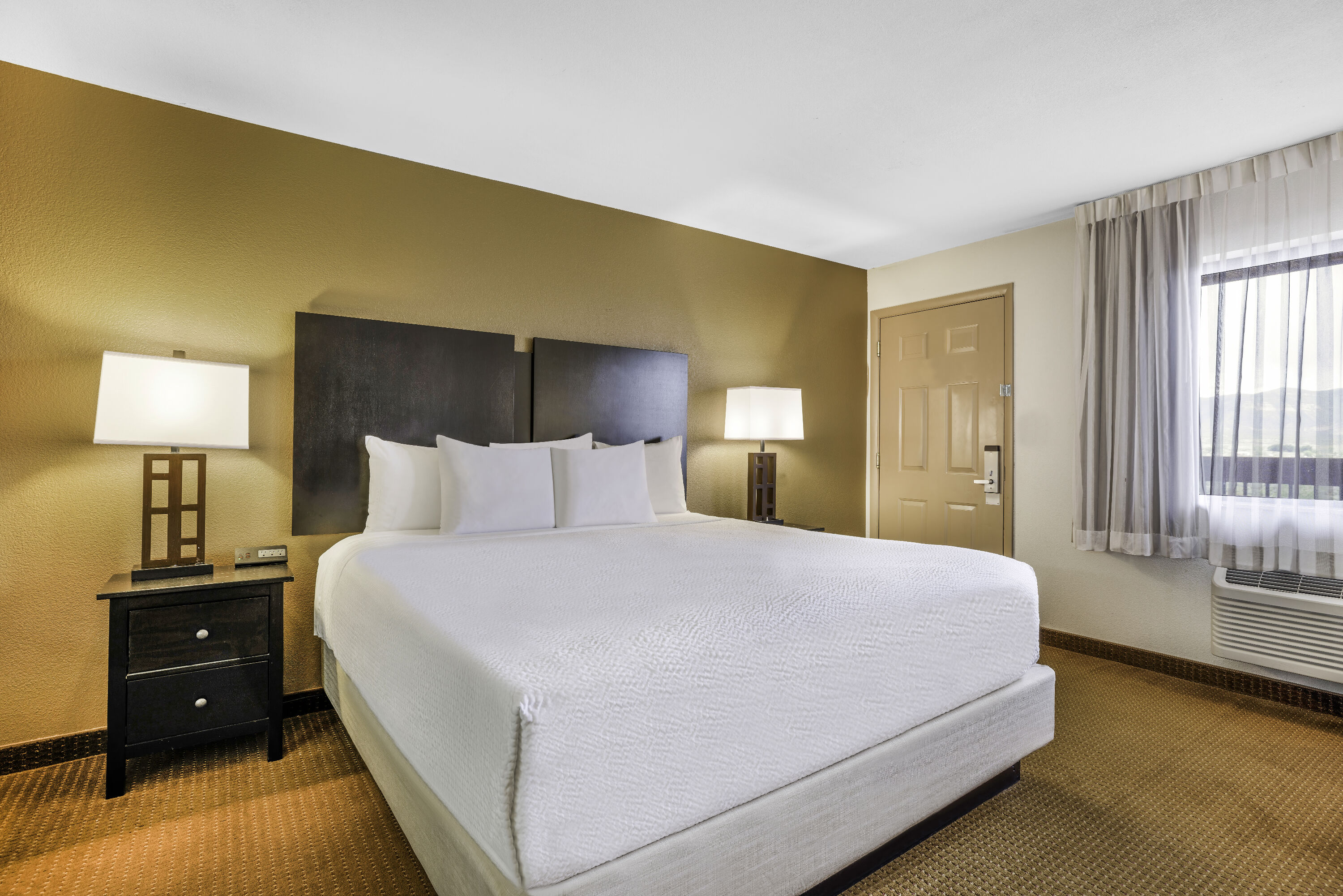 King bed guest room at the Baymont by Wyndham Cortez in Cortez, Colorado