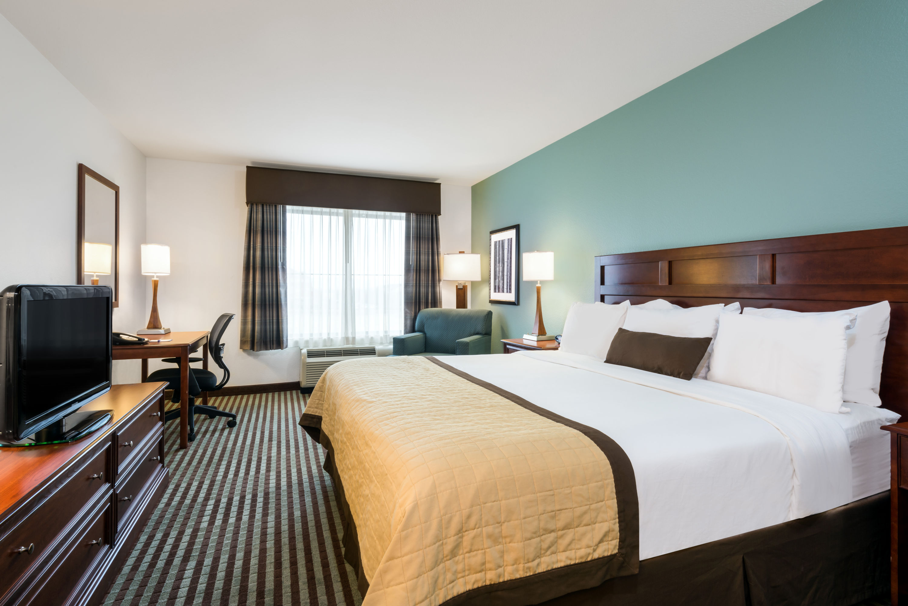 Guest room at the Baymont by Wyndham Denver International Airport in Denver, Colorado