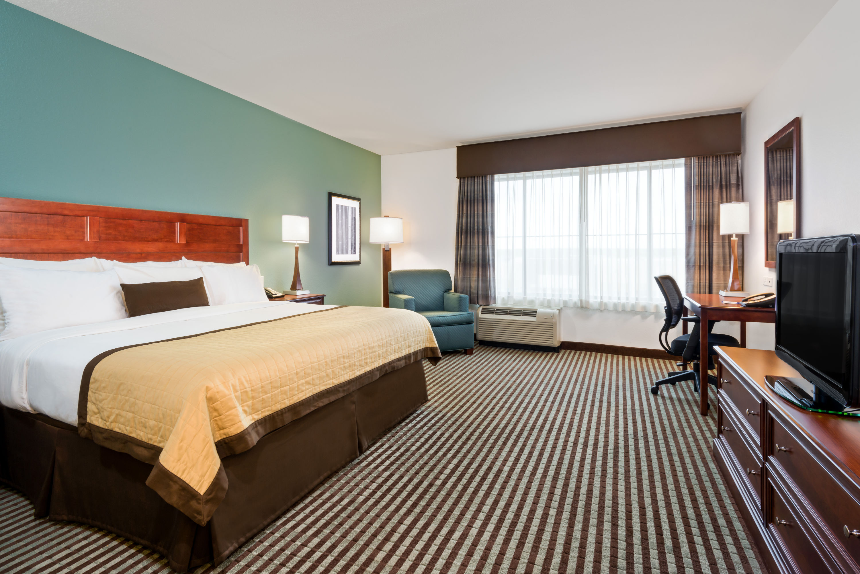 Guest room at the Baymont by Wyndham Denver International Airport in Denver, Colorado