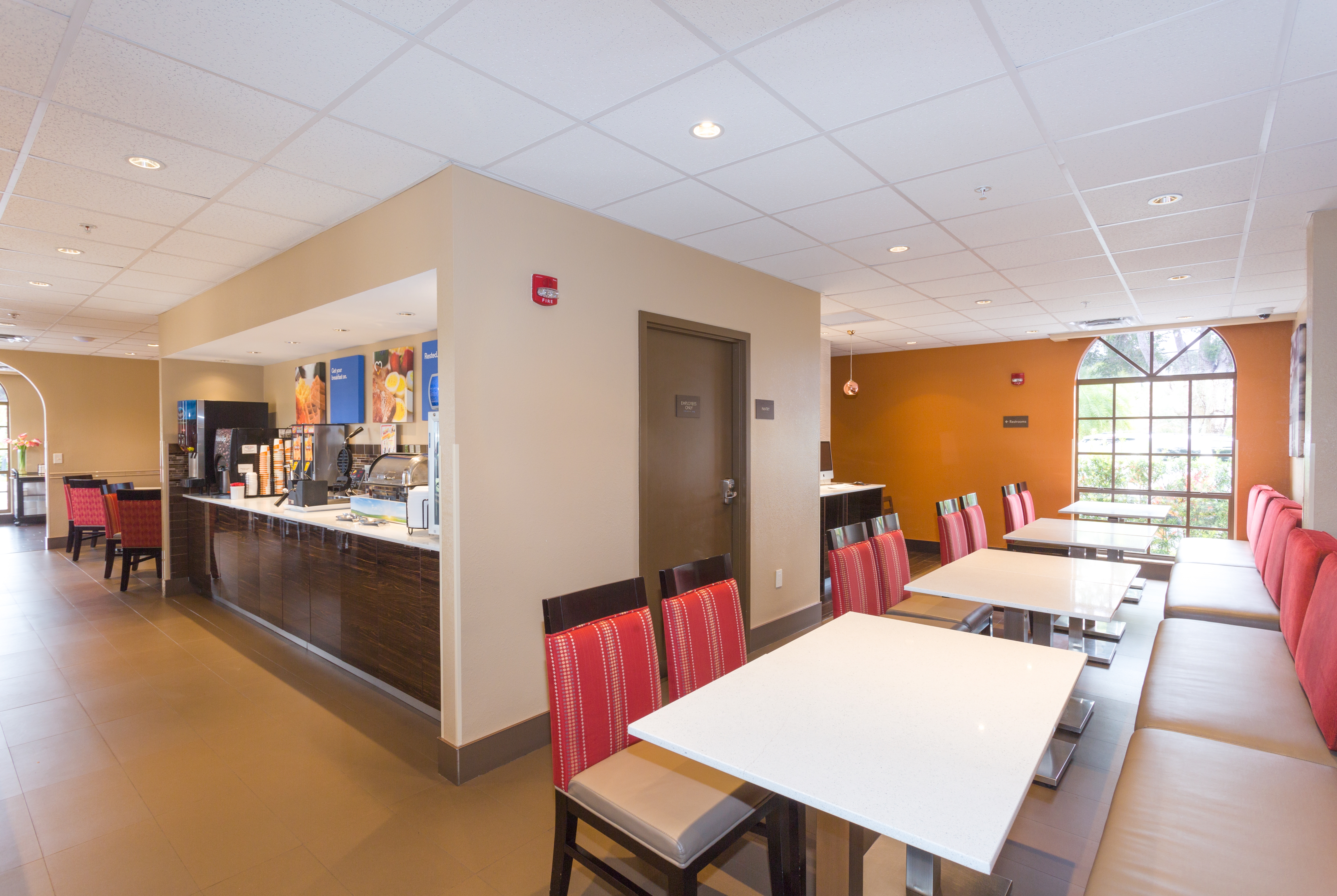 Baymont by Wyndham Bonita Springs Naples North restaurant breakfast area with seating in Bonita Springs, Florida