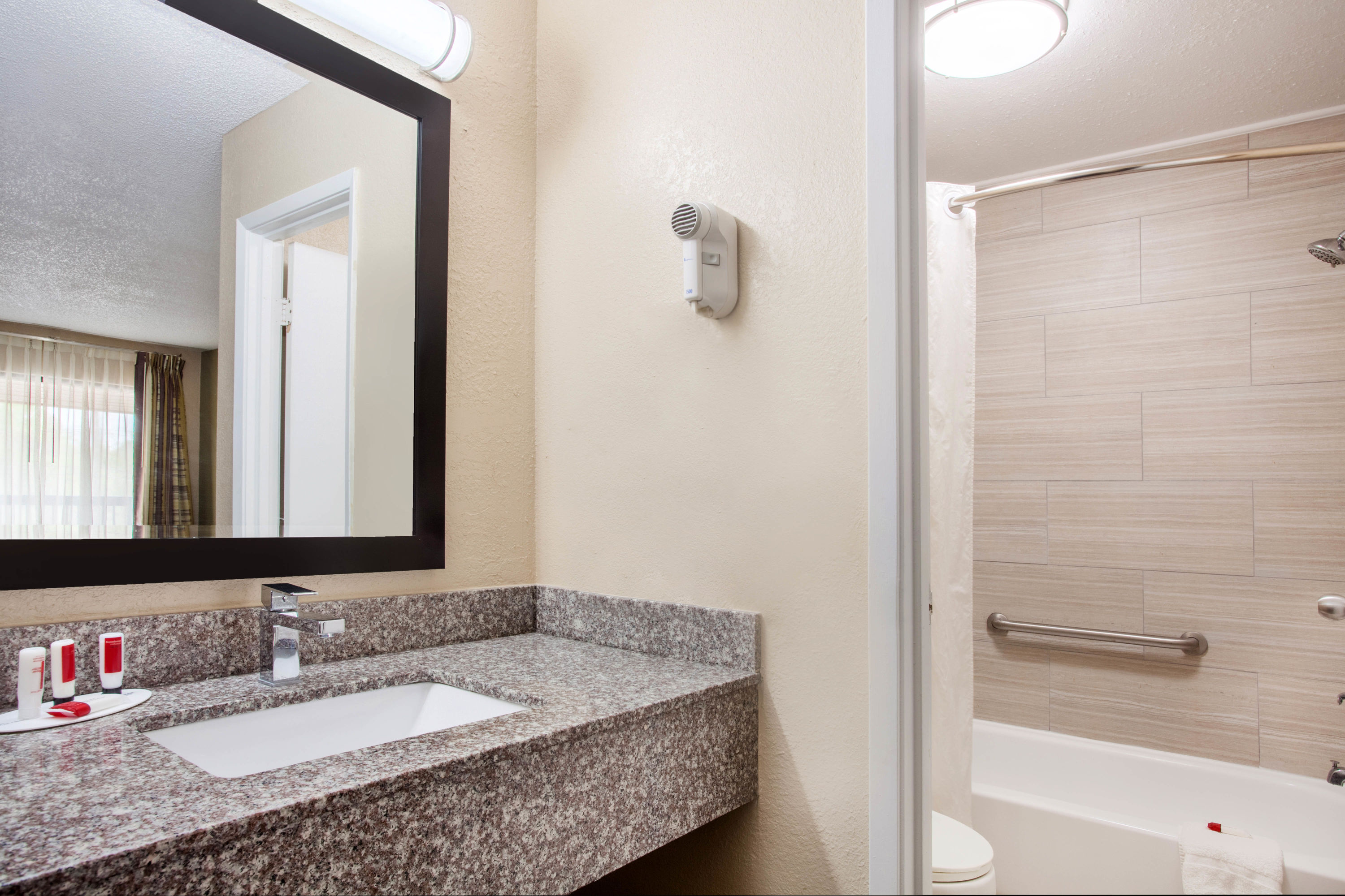 Guest room bath at the Baymont by Wyndham Lake City I-75 in Lake City, Florida