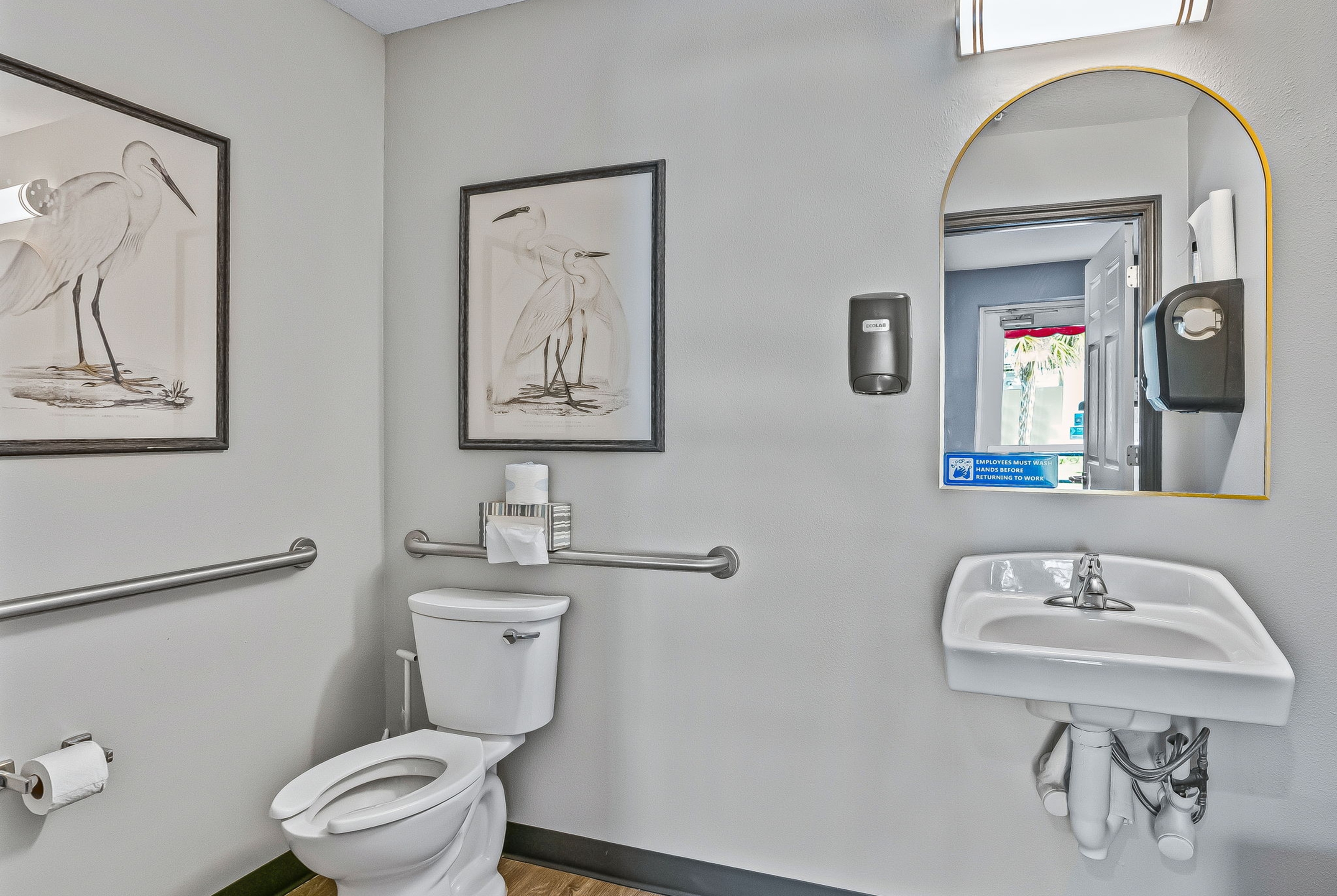 Guest room bath at the Baymont by Wyndham Ocala Suites in Ocala, Florida