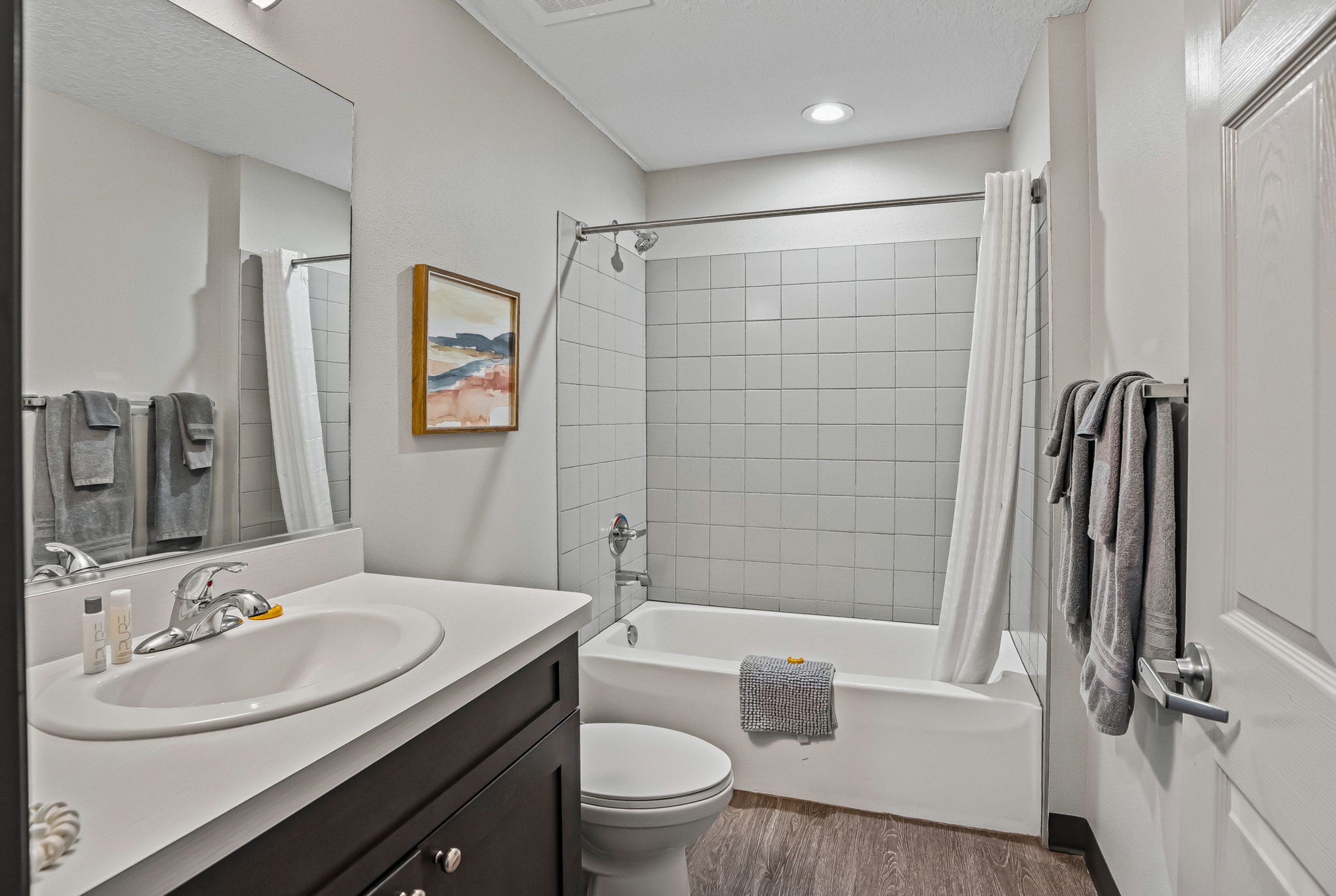 Guest room bath at the Baymont by Wyndham Ocala Suites in Ocala, Florida