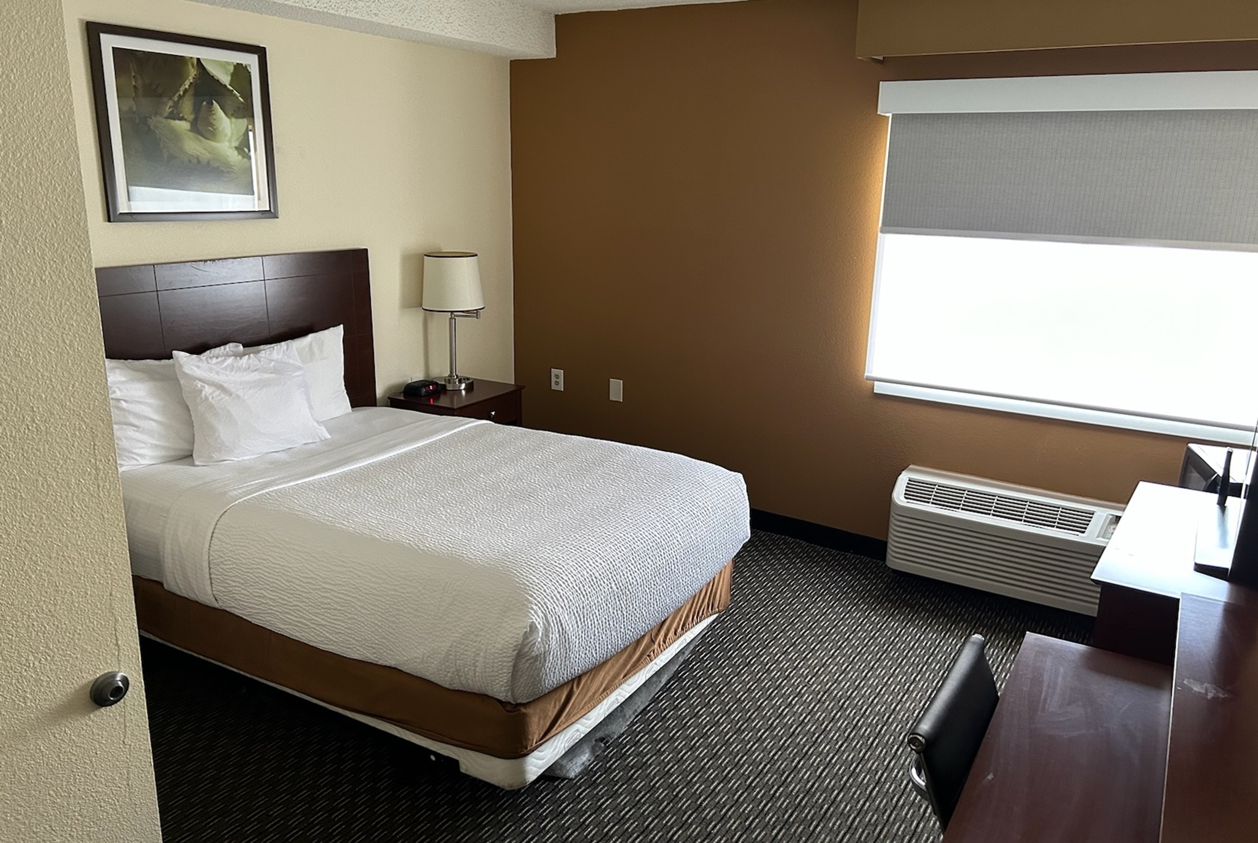 Guest room at the Baymont by Wyndham Orlando South in Orlando, Florida