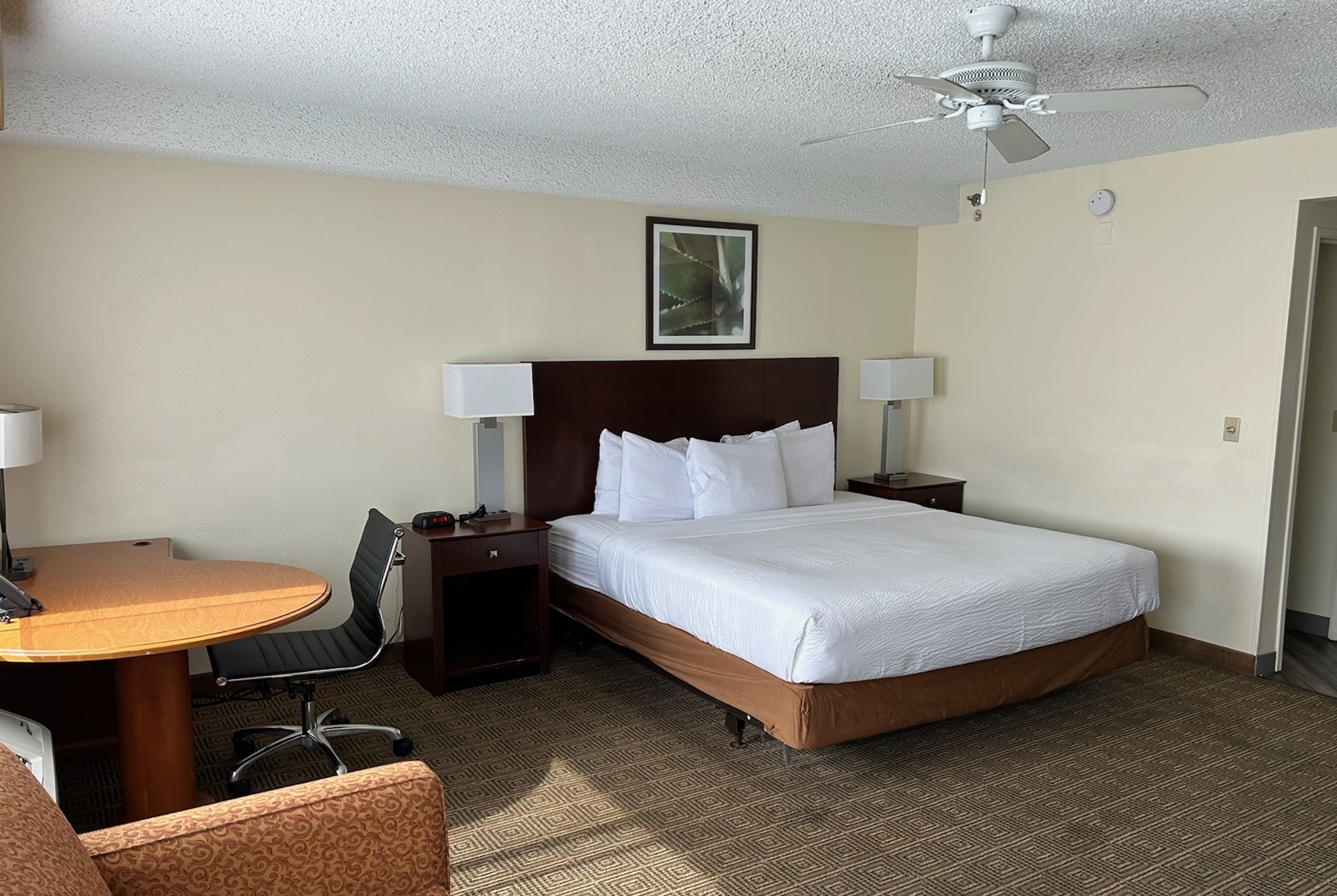 Guest room at the Baymont by Wyndham Orlando South in Orlando, Florida