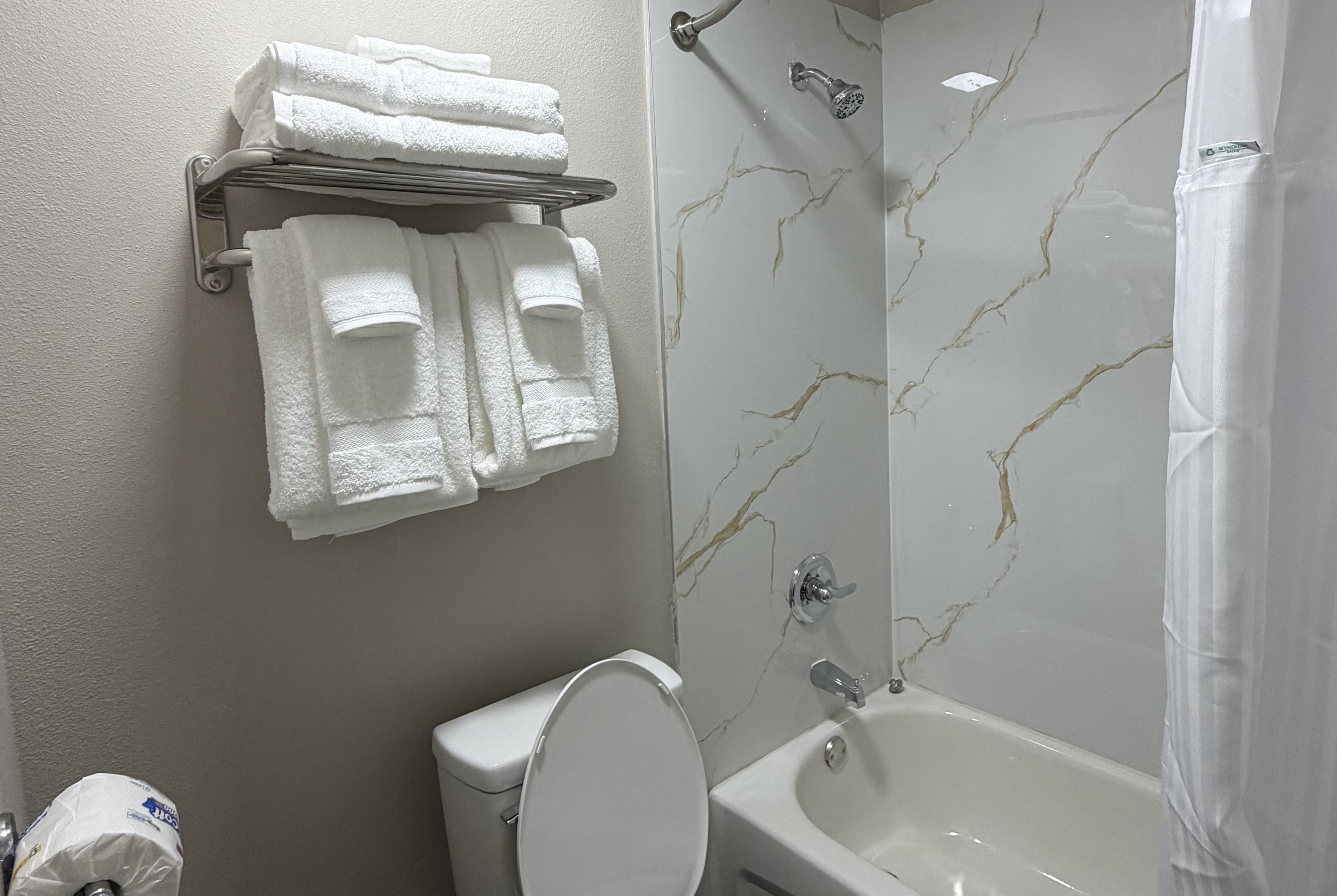 Guest room bath at the Baymont by Wyndham Pensacola NAS Corry Area in Pensacola, Florida