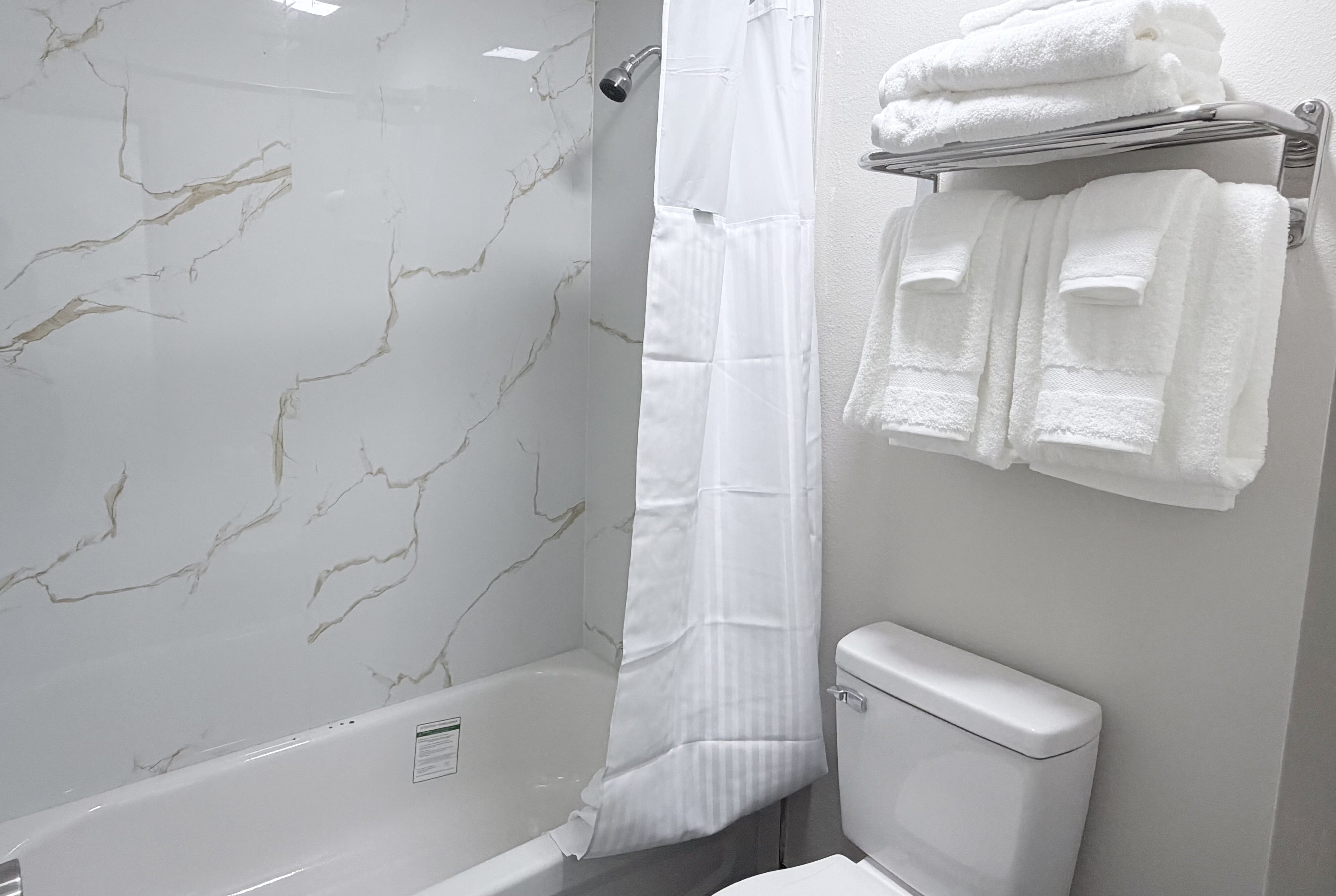 Guest room bath at the Baymont by Wyndham Pensacola NAS Corry Area in Pensacola, Florida