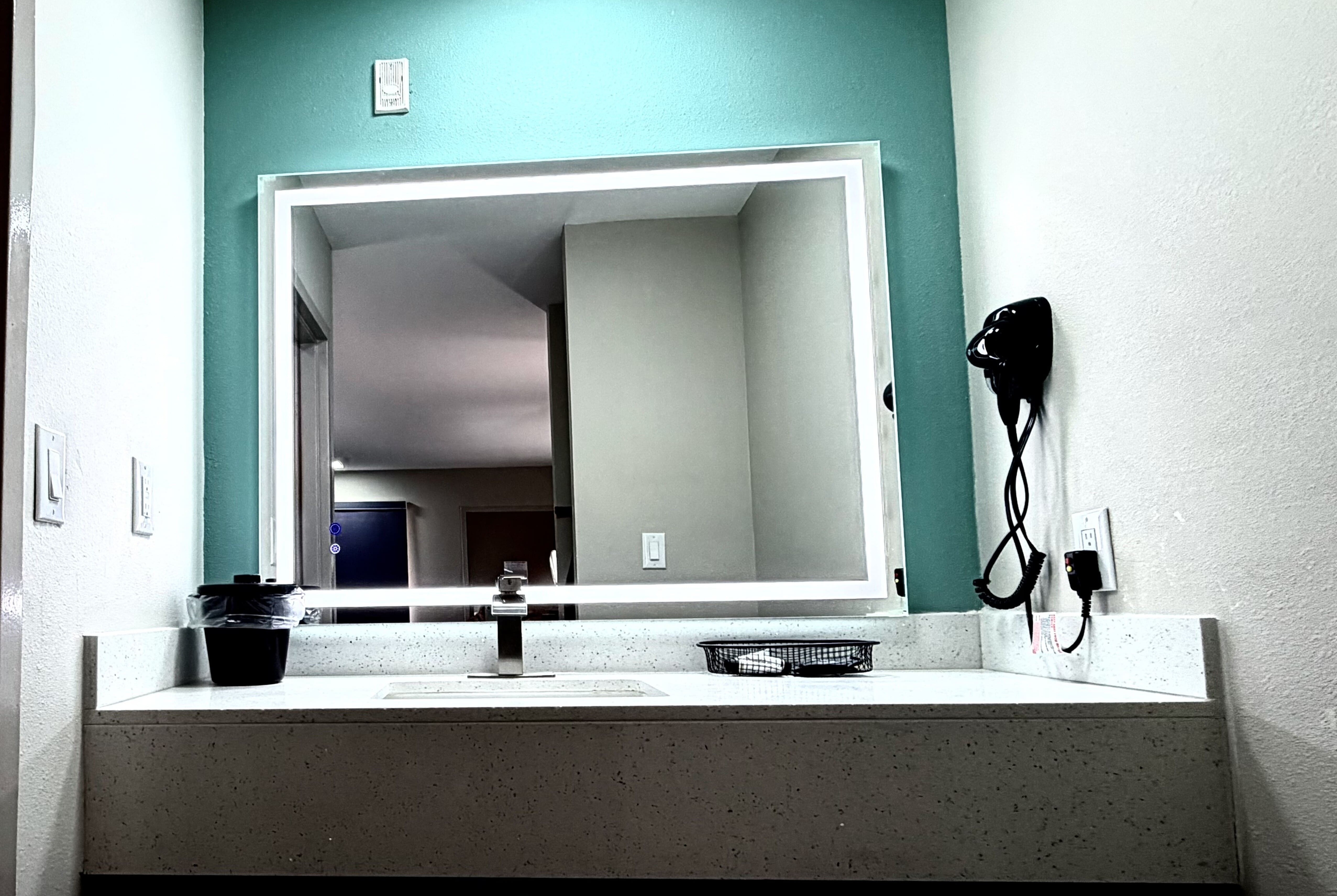 Guest room bath at the Baymont by Wyndham Pensacola NAS Corry Area in Pensacola, Florida