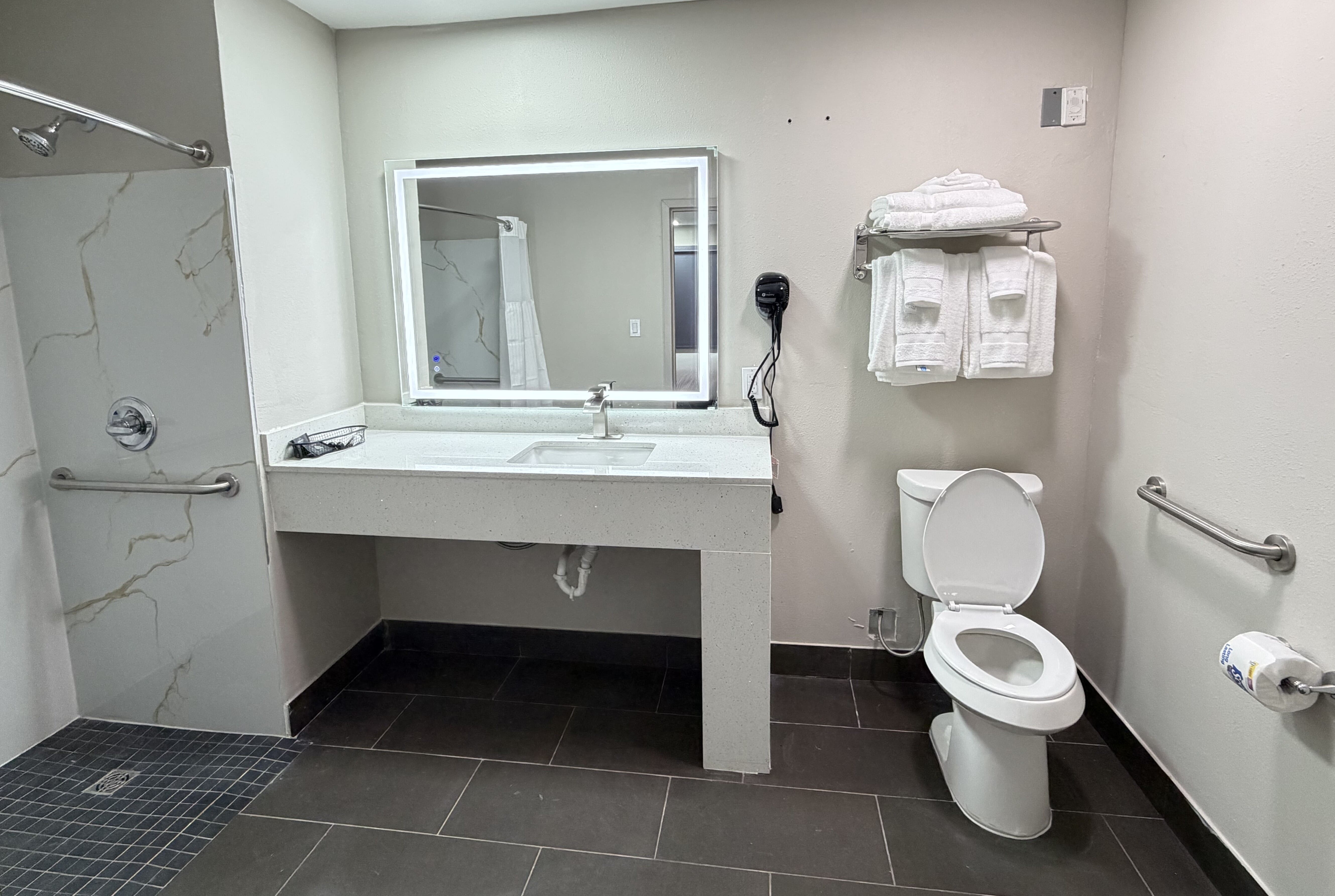 Guest room bath at the Baymont by Wyndham Pensacola NAS Corry Area in Pensacola, Florida