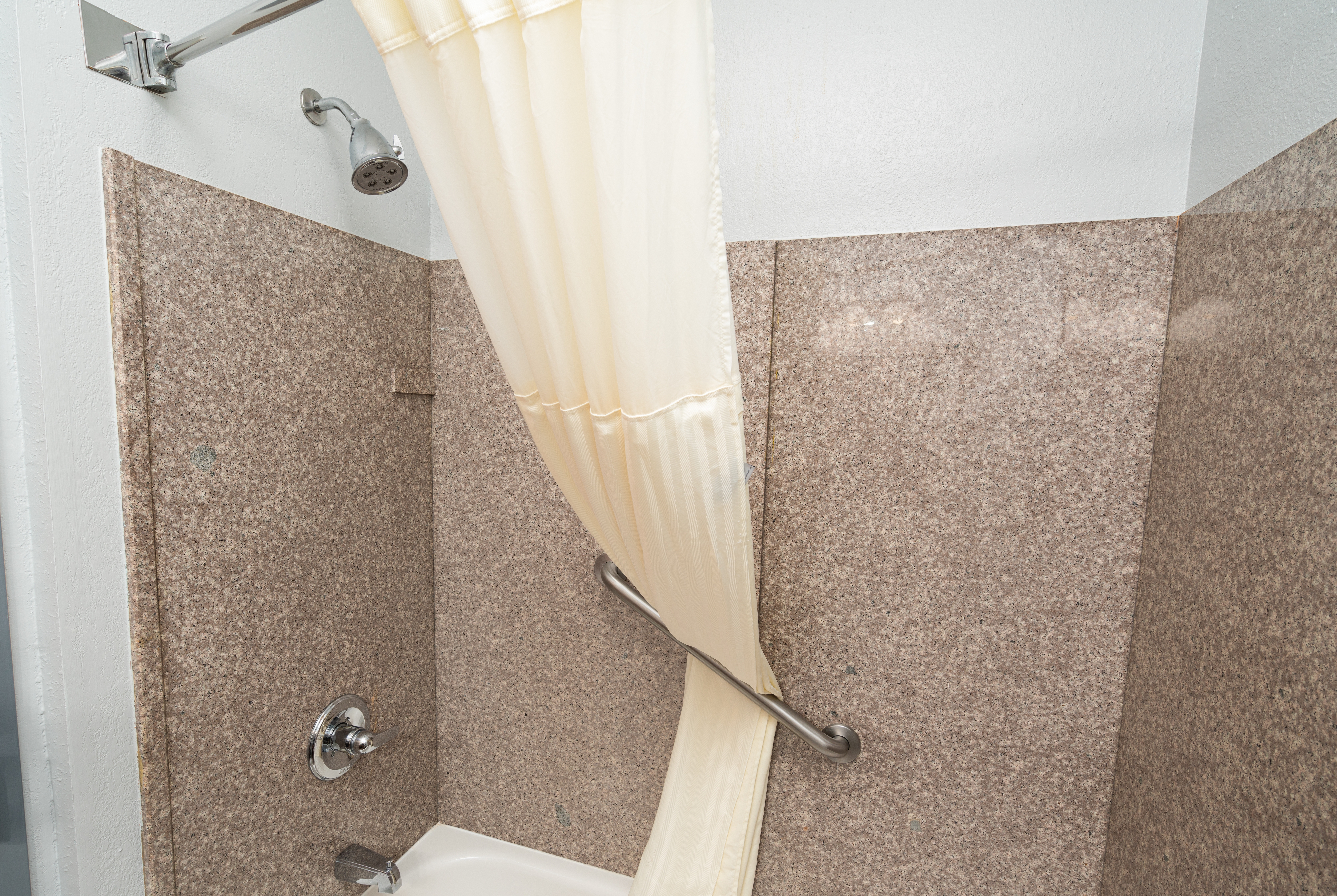 Guest room bath at the Baymont by Wyndham Augusta Riverwatch in Augusta, Georgia