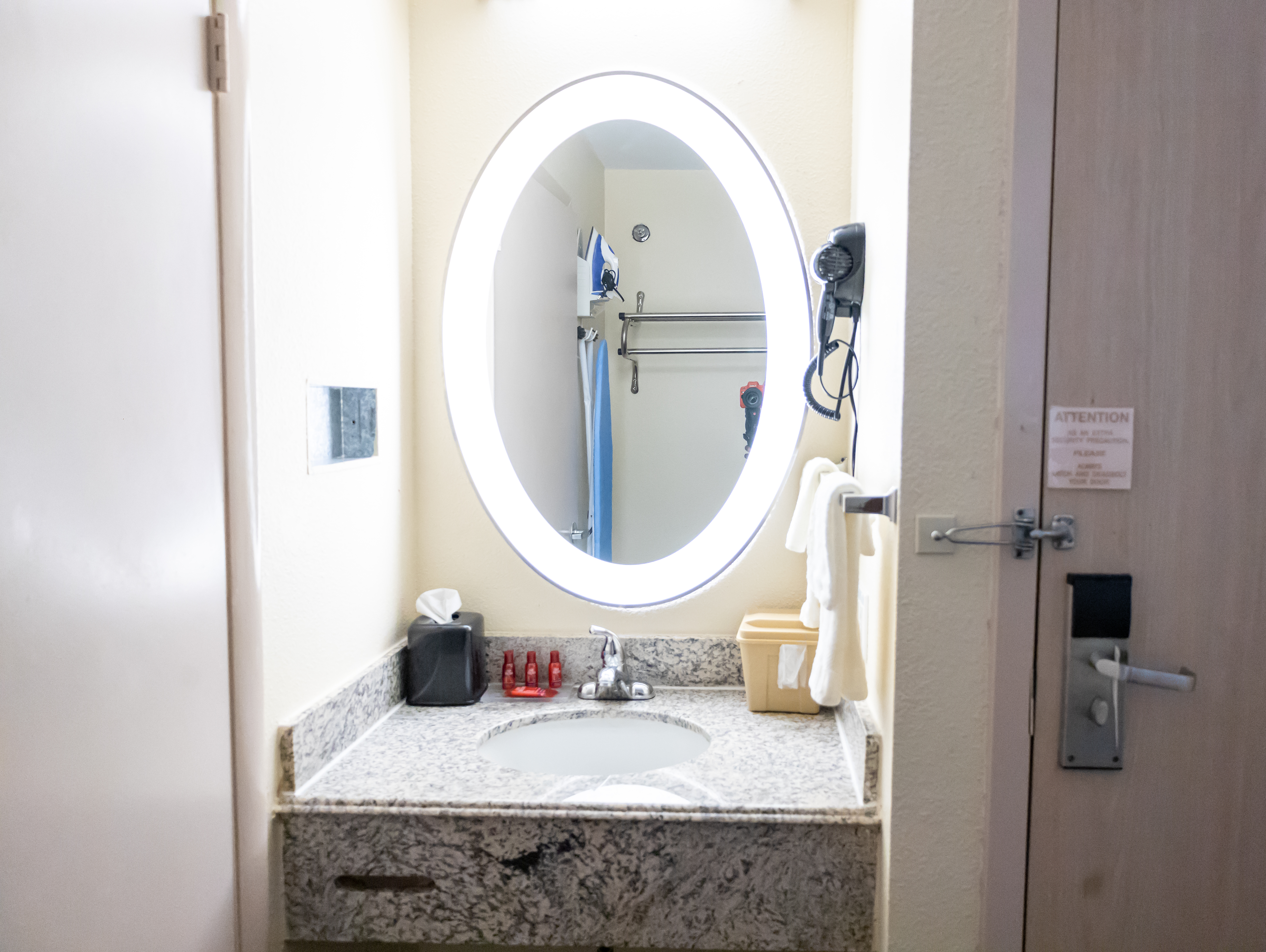 Guest room bath at the Baymont by Wyndham College Park Atlanta Airport South in College Park, Georgia