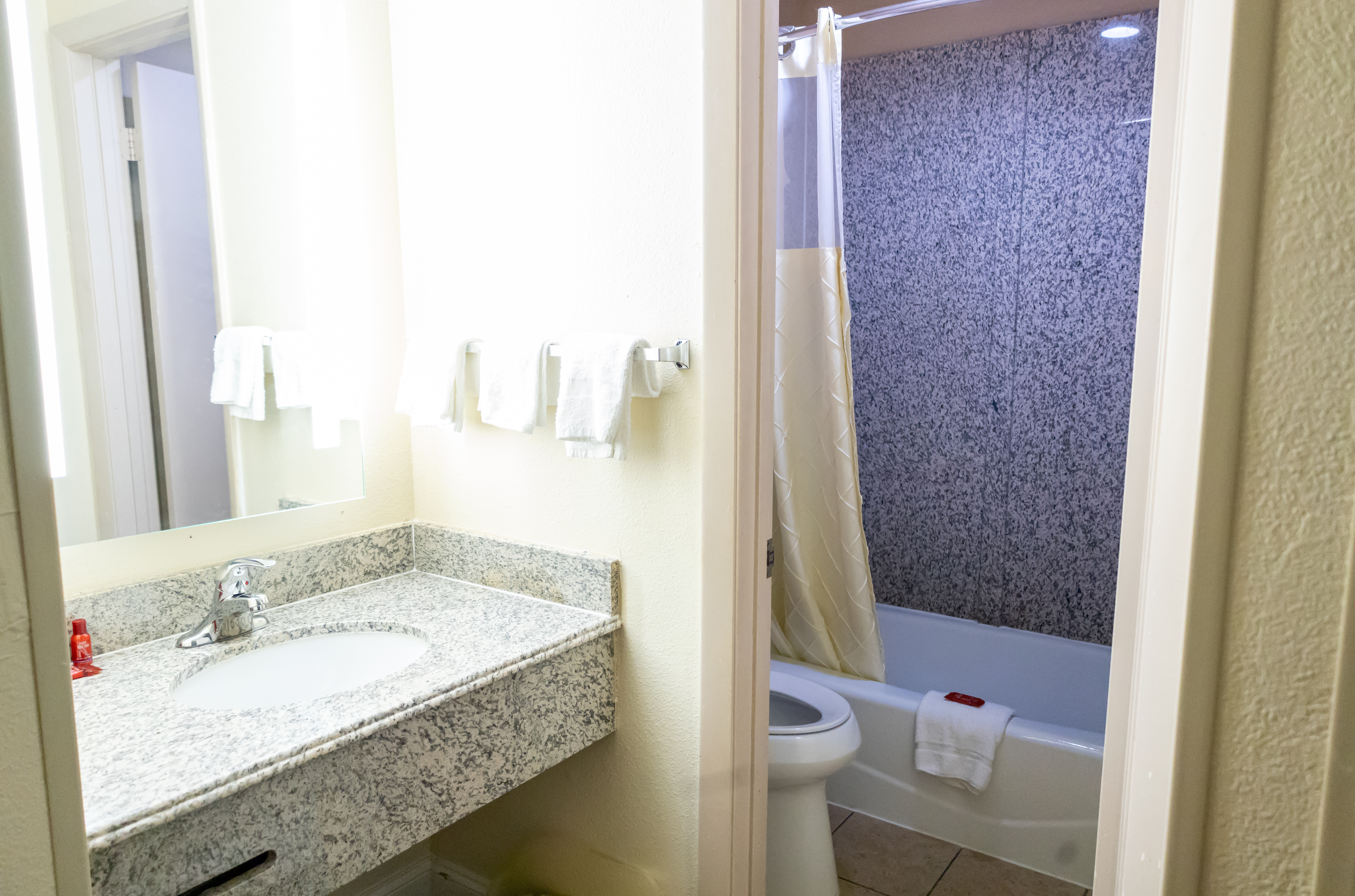 Guest room bath at the Baymont by Wyndham College Park Atlanta Airport South in College Park, Georgia