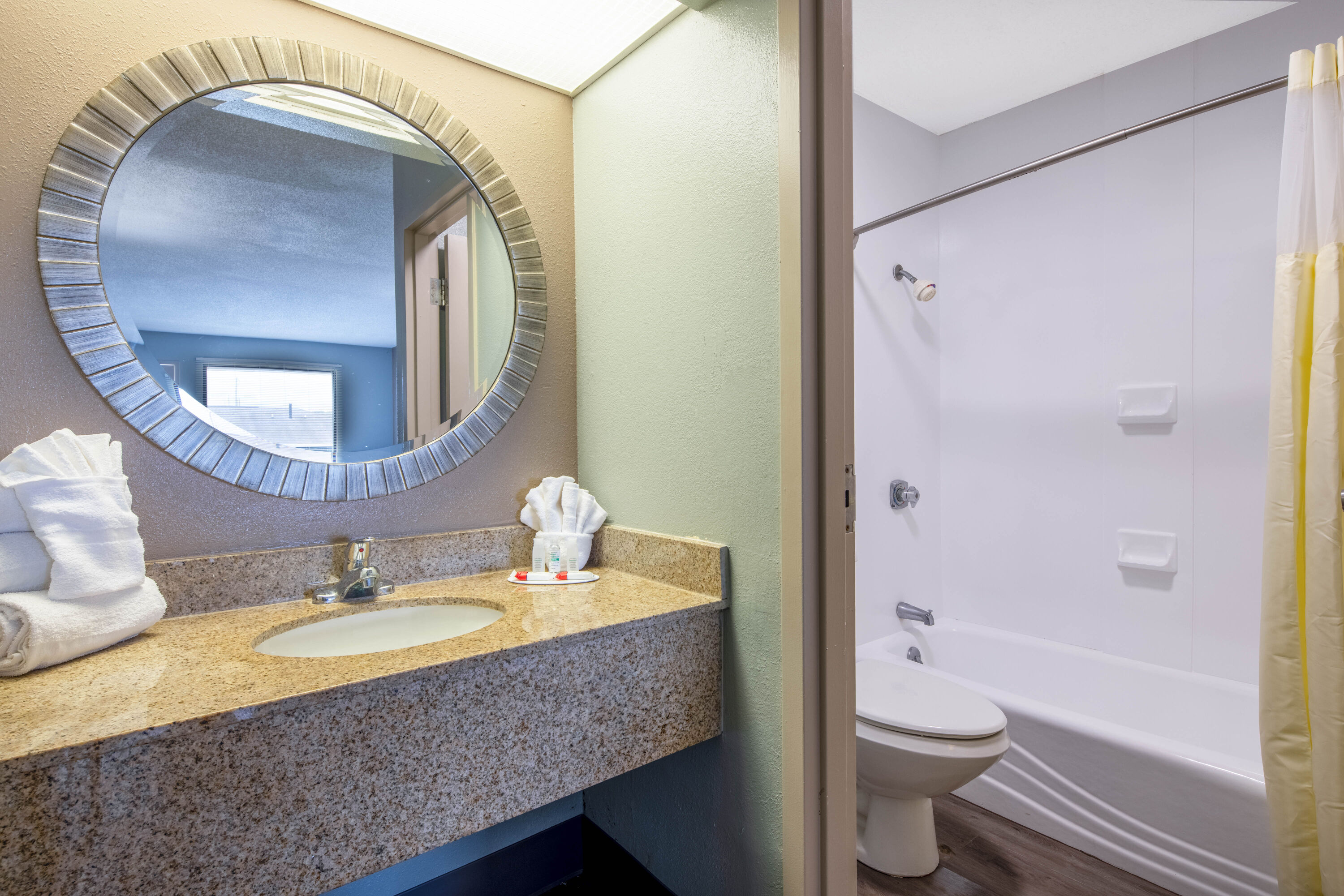 Guest room bath at the Baymont by Wyndham Covington in Covington, Georgia