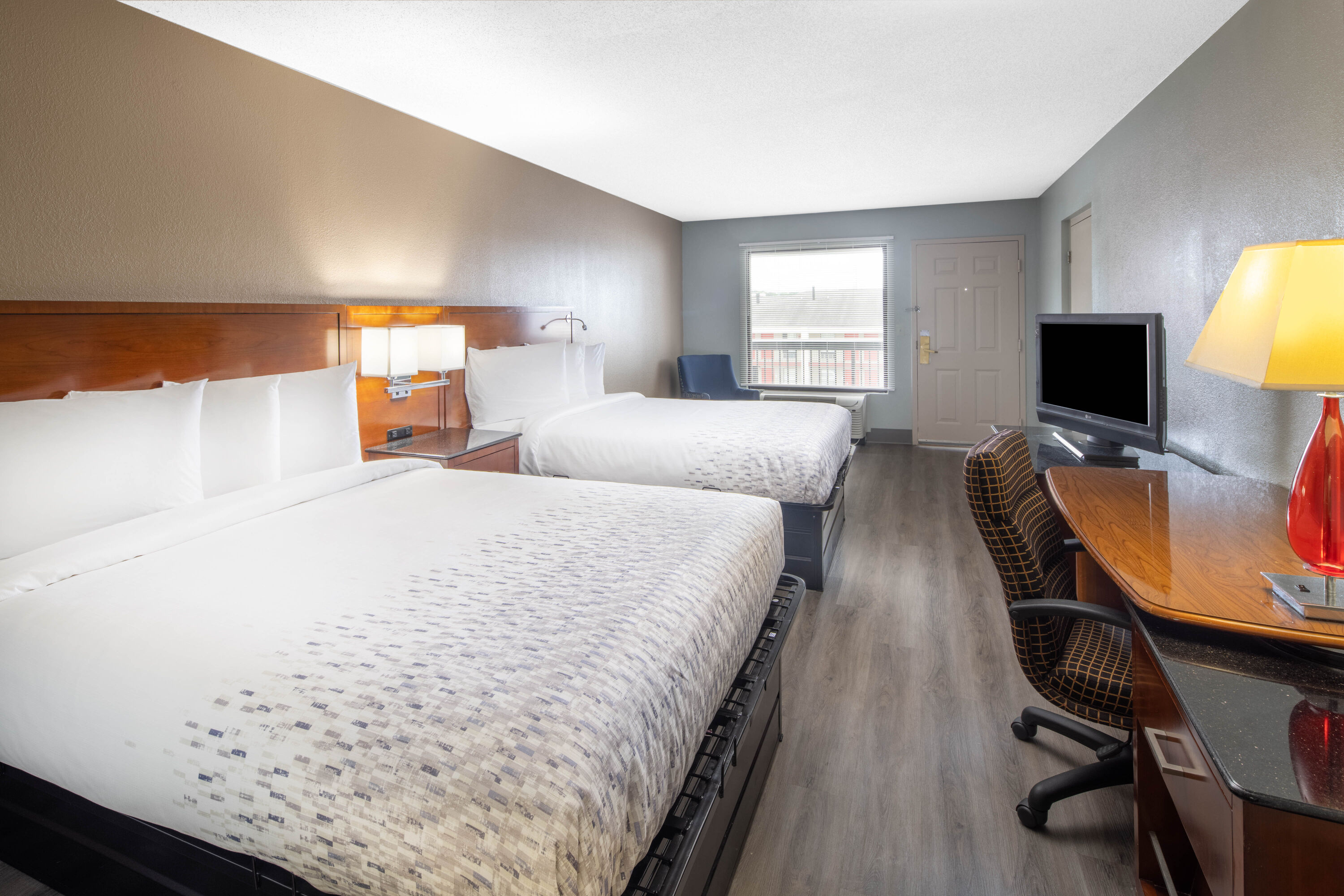 Guest room at the Baymont by Wyndham Covington in Covington, Georgia