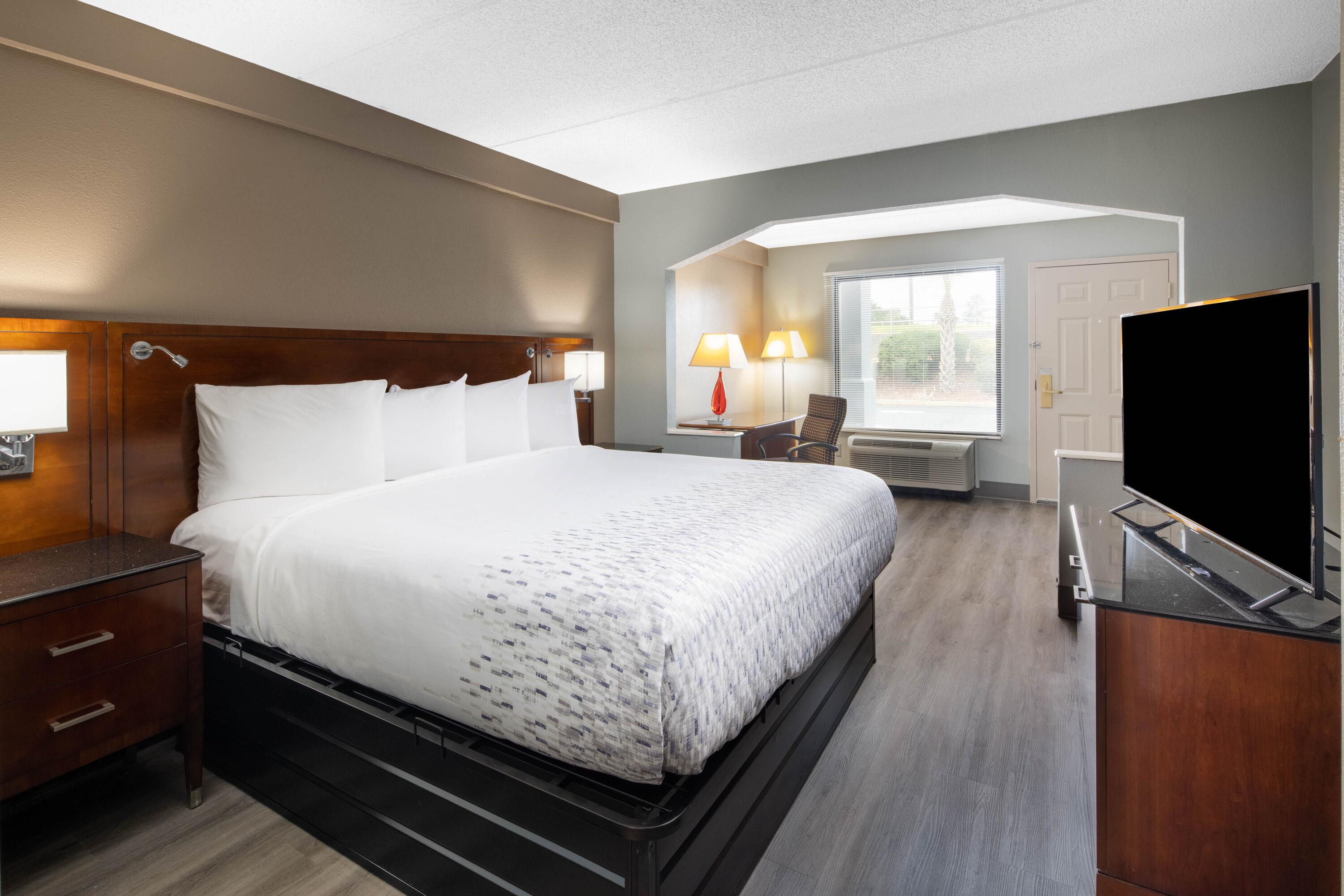 Guest room at the Baymont by Wyndham Covington in Covington, Georgia