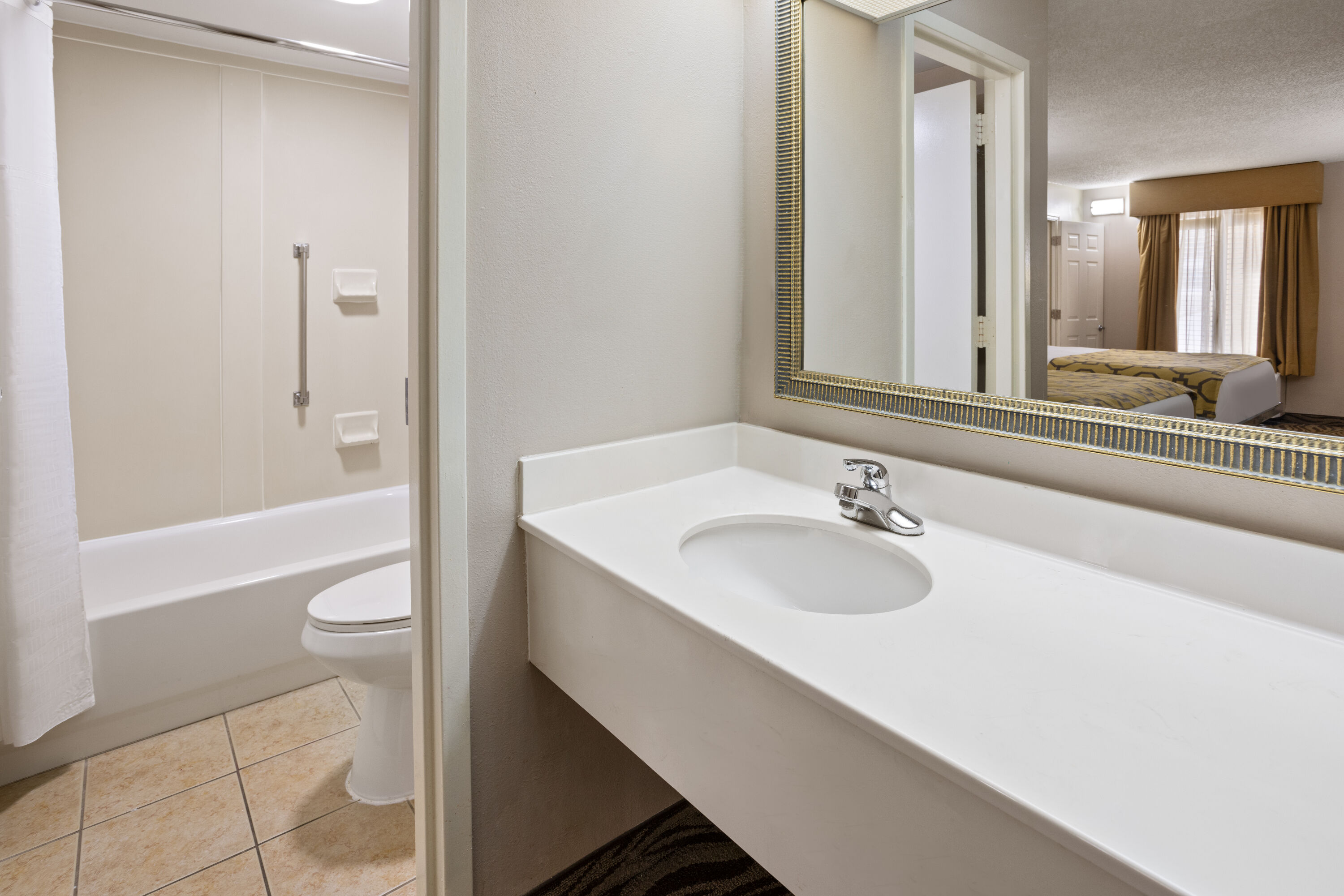 Guest room bath at the Baymont by Wyndham Griffin in Griffin, Georgia