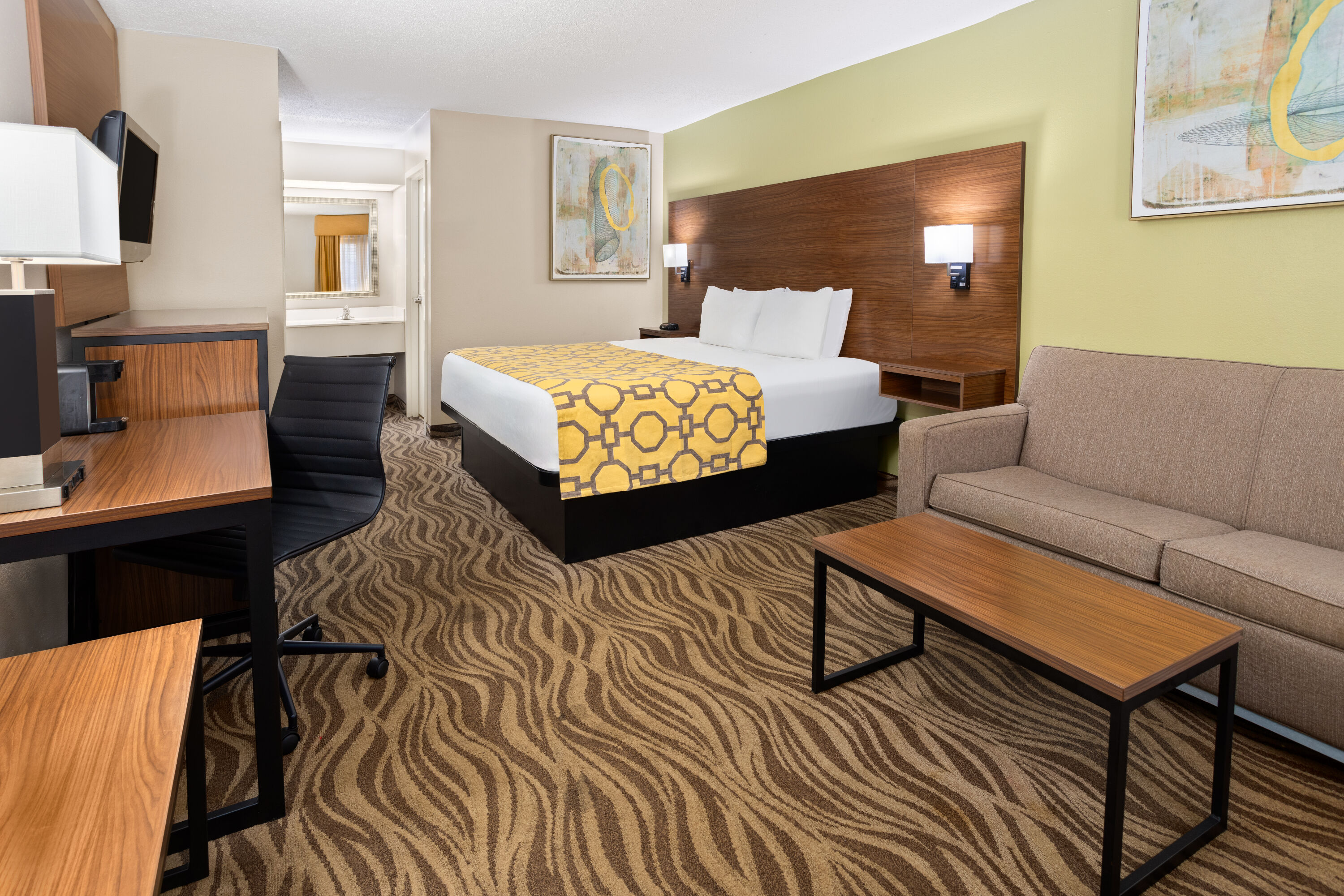 Guest room at the Baymont by Wyndham Griffin in Griffin, Georgia