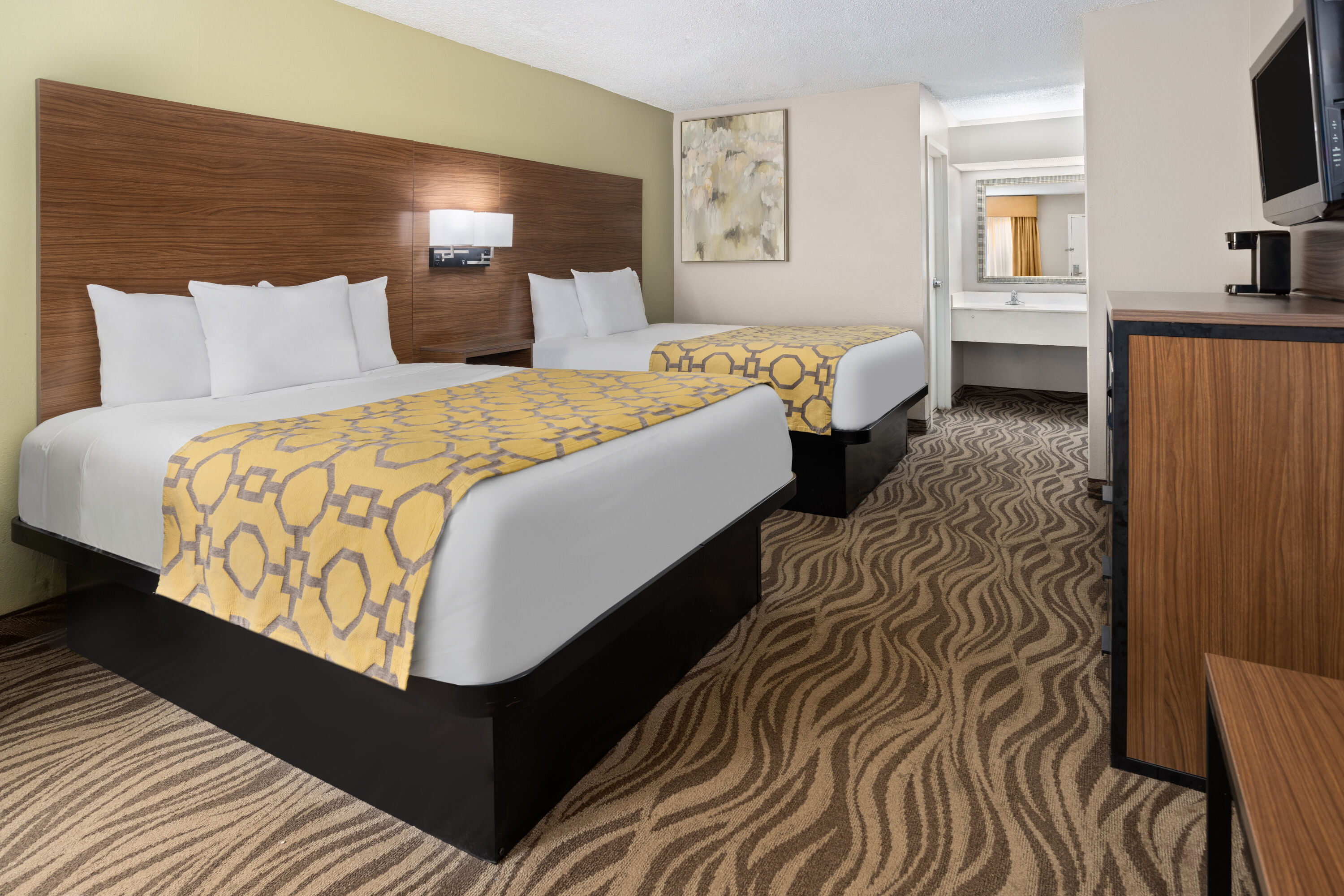 Guest room at the Baymont by Wyndham Griffin in Griffin, Georgia