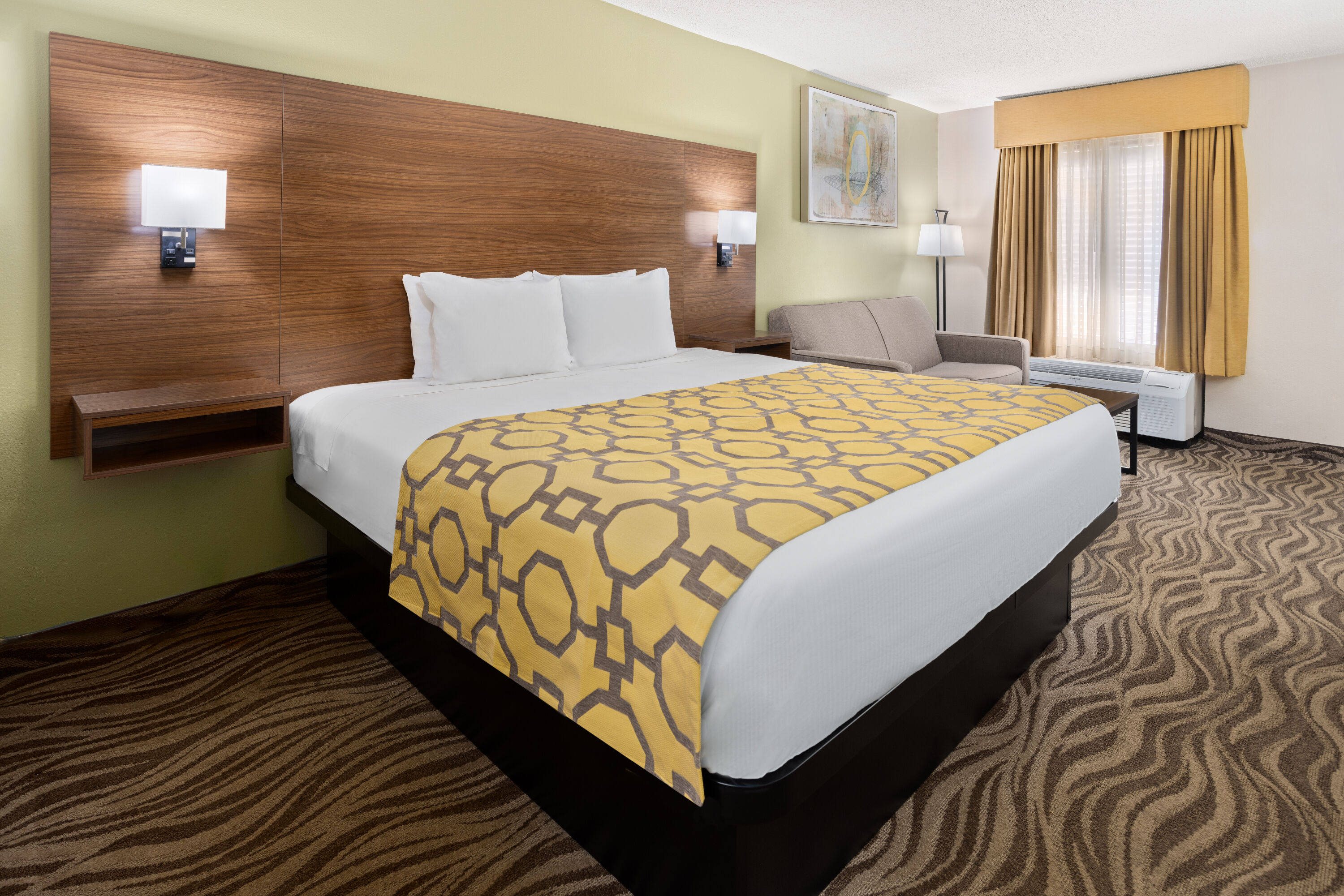 Guest room at the Baymont by Wyndham Griffin in Griffin, Georgia