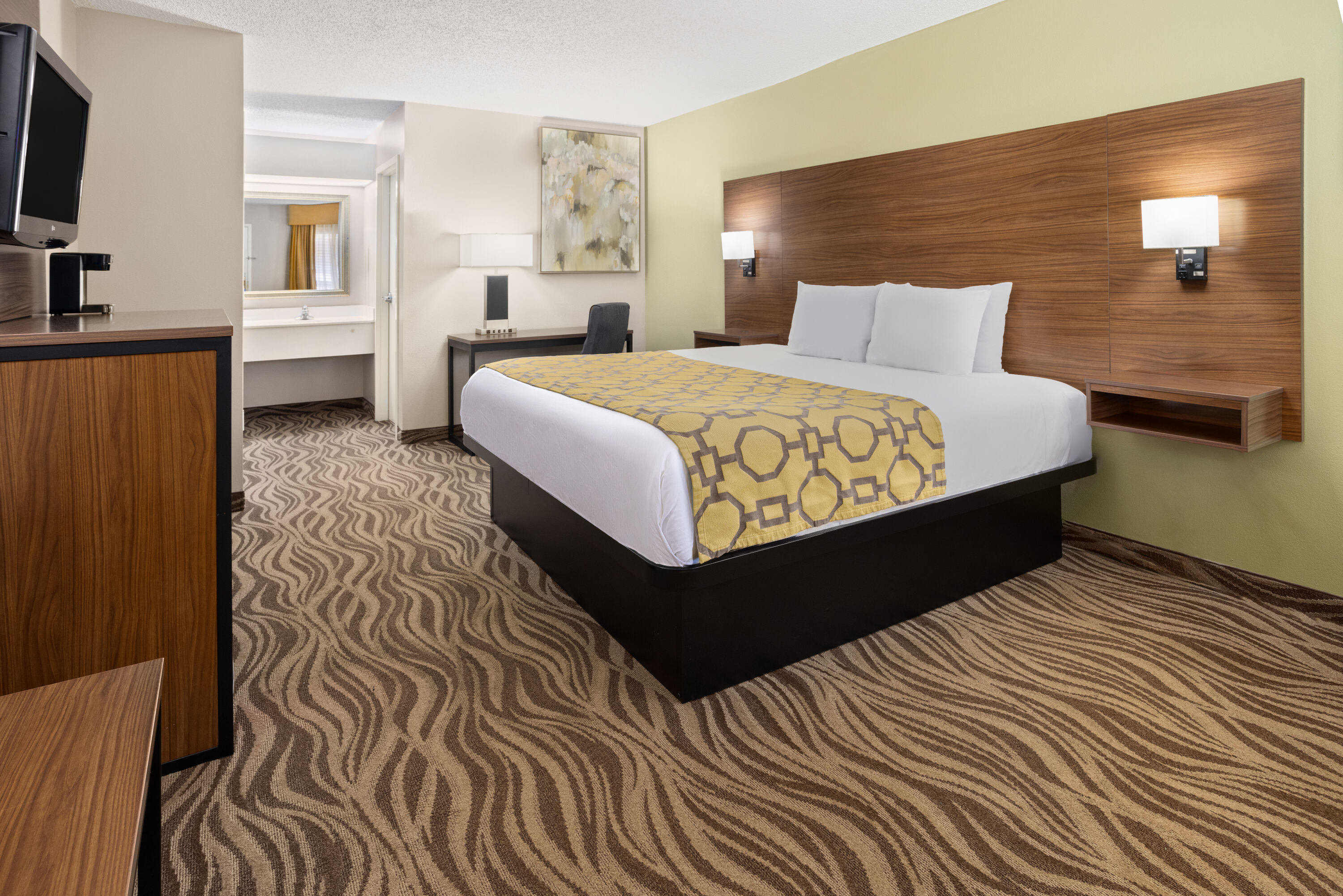 Guest room at the Baymont by Wyndham Griffin in Griffin, Georgia