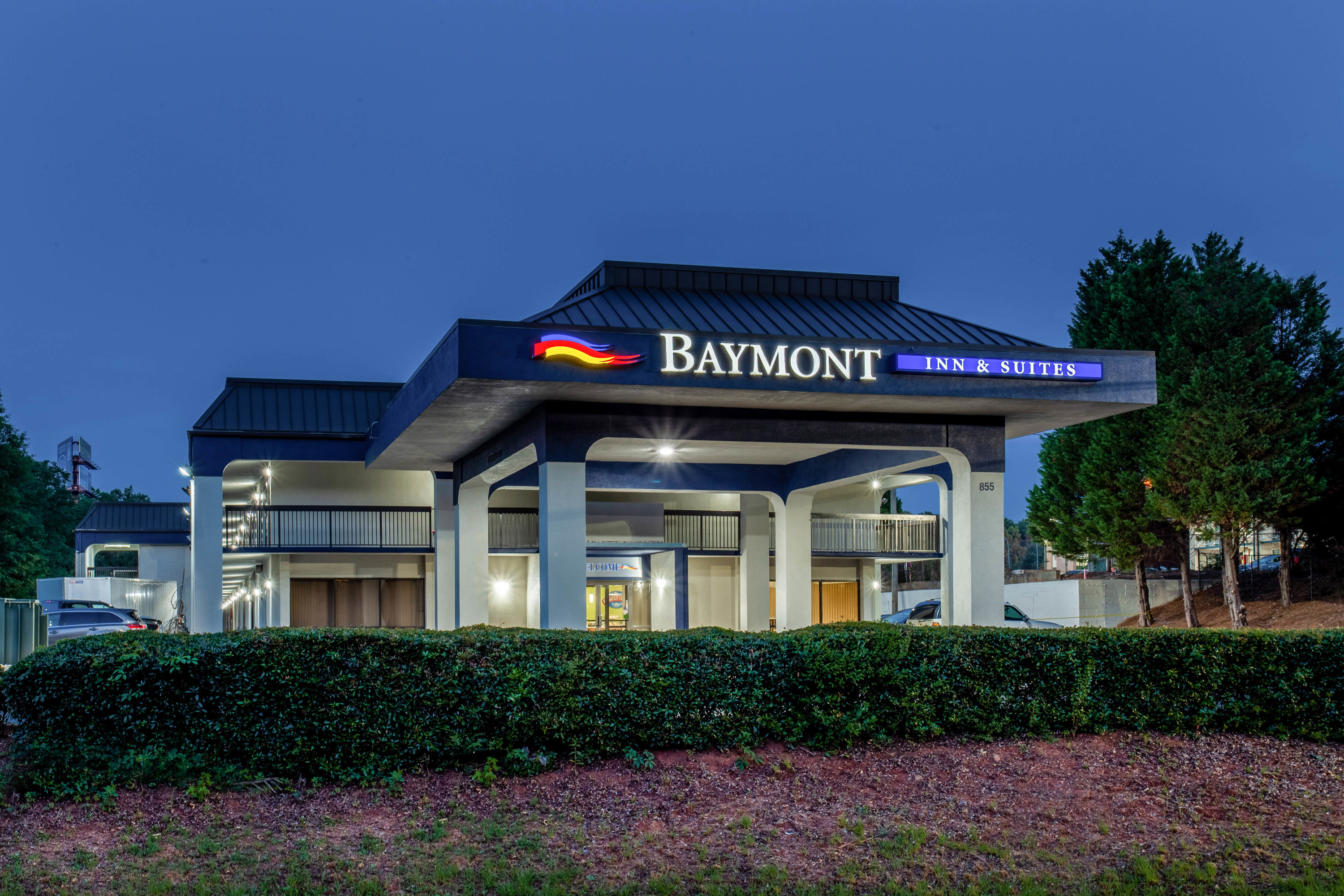 Exterior Dusk Image of Baymont by Wyndham McDonough hotel in McDonough, Georgia