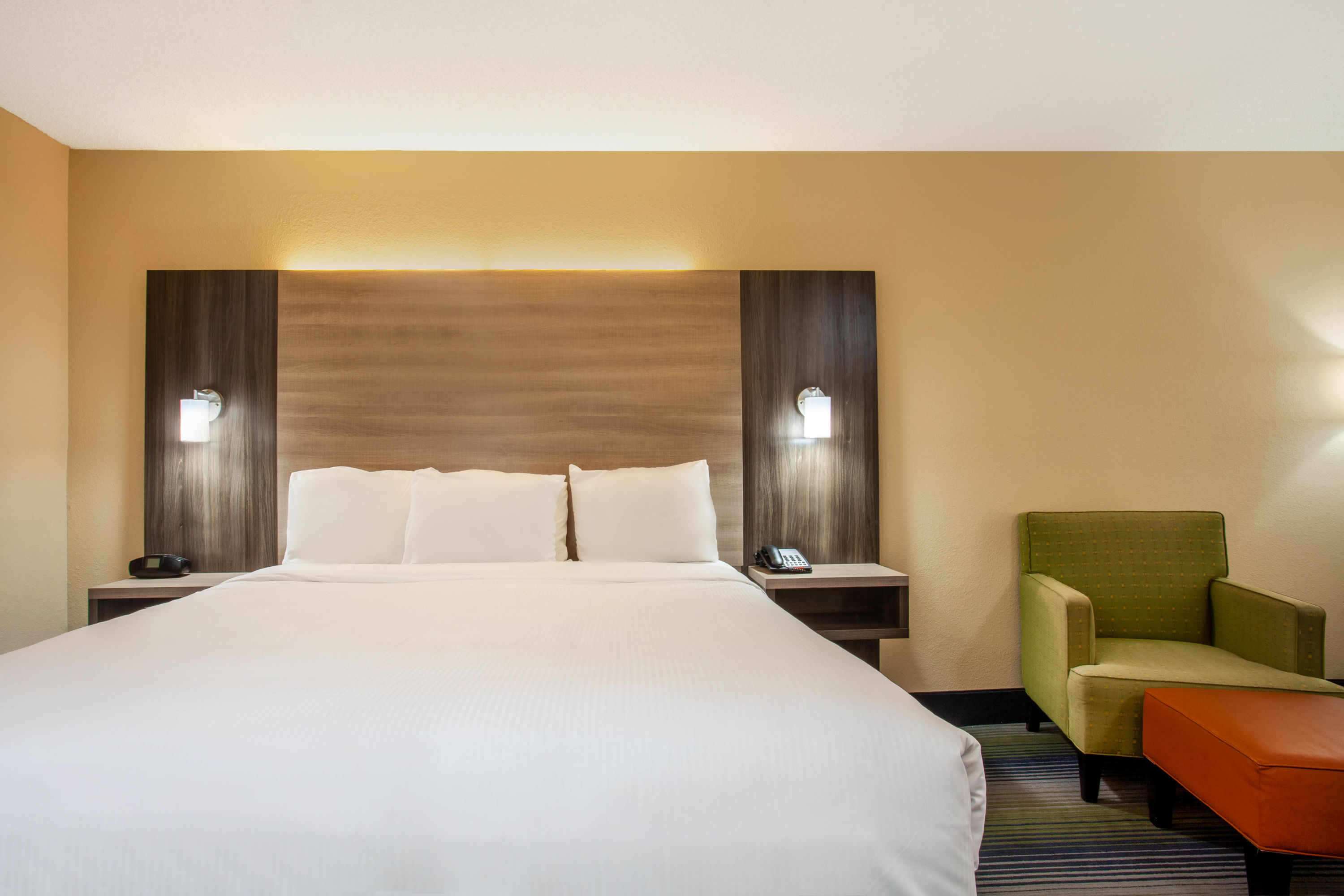 Guest room at the Baymont by Wyndham McDonough in McDonough, Georgia