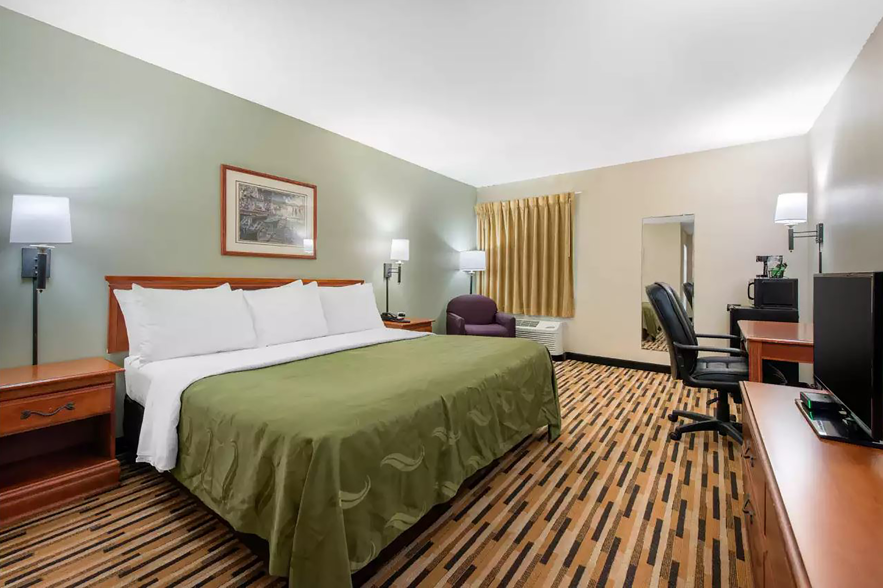 Guest room at the Baymont by Wyndham Port Wentworth in Port Wentworth, Georgia