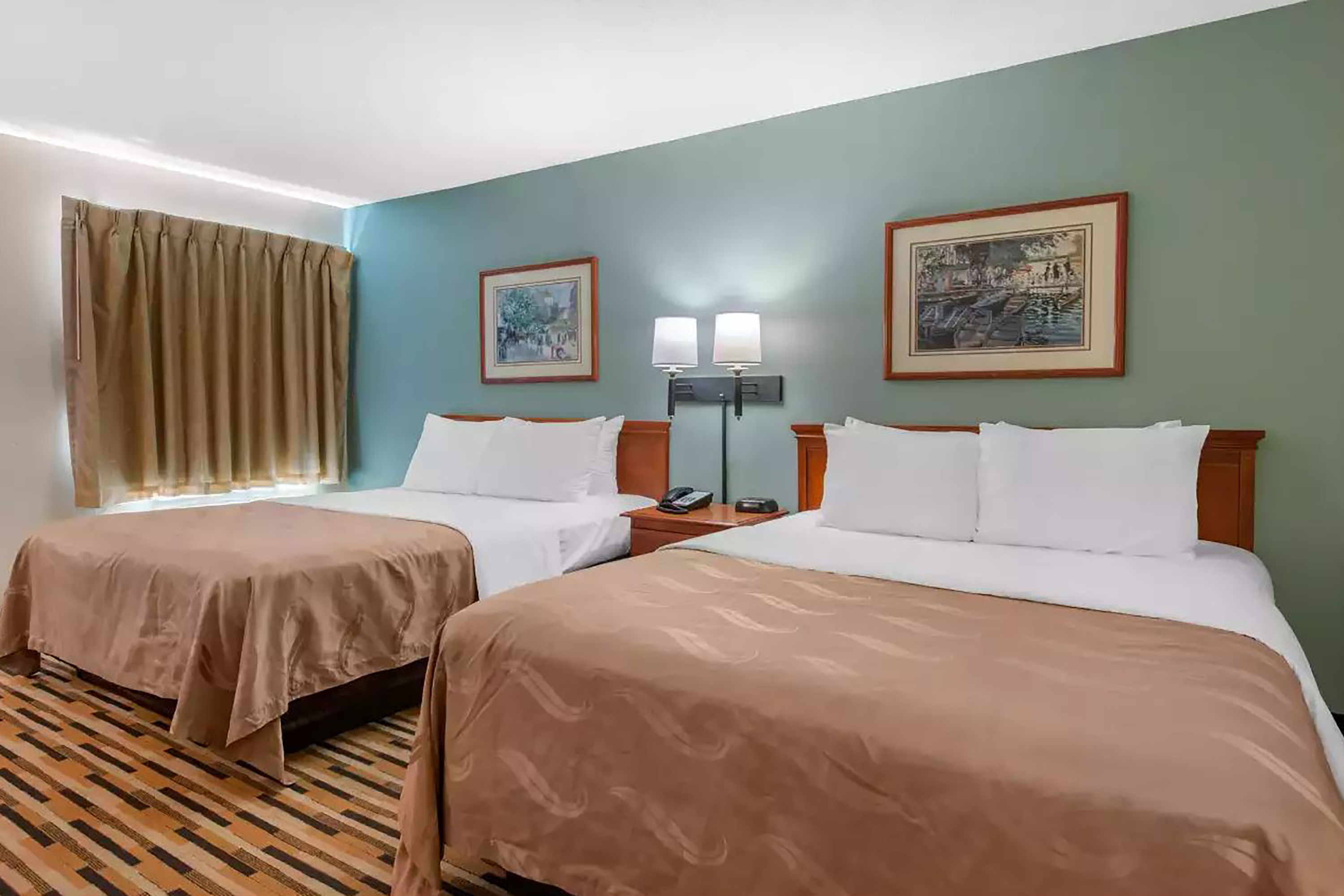 Guest room at the Baymont by Wyndham Port Wentworth in Port Wentworth, Georgia