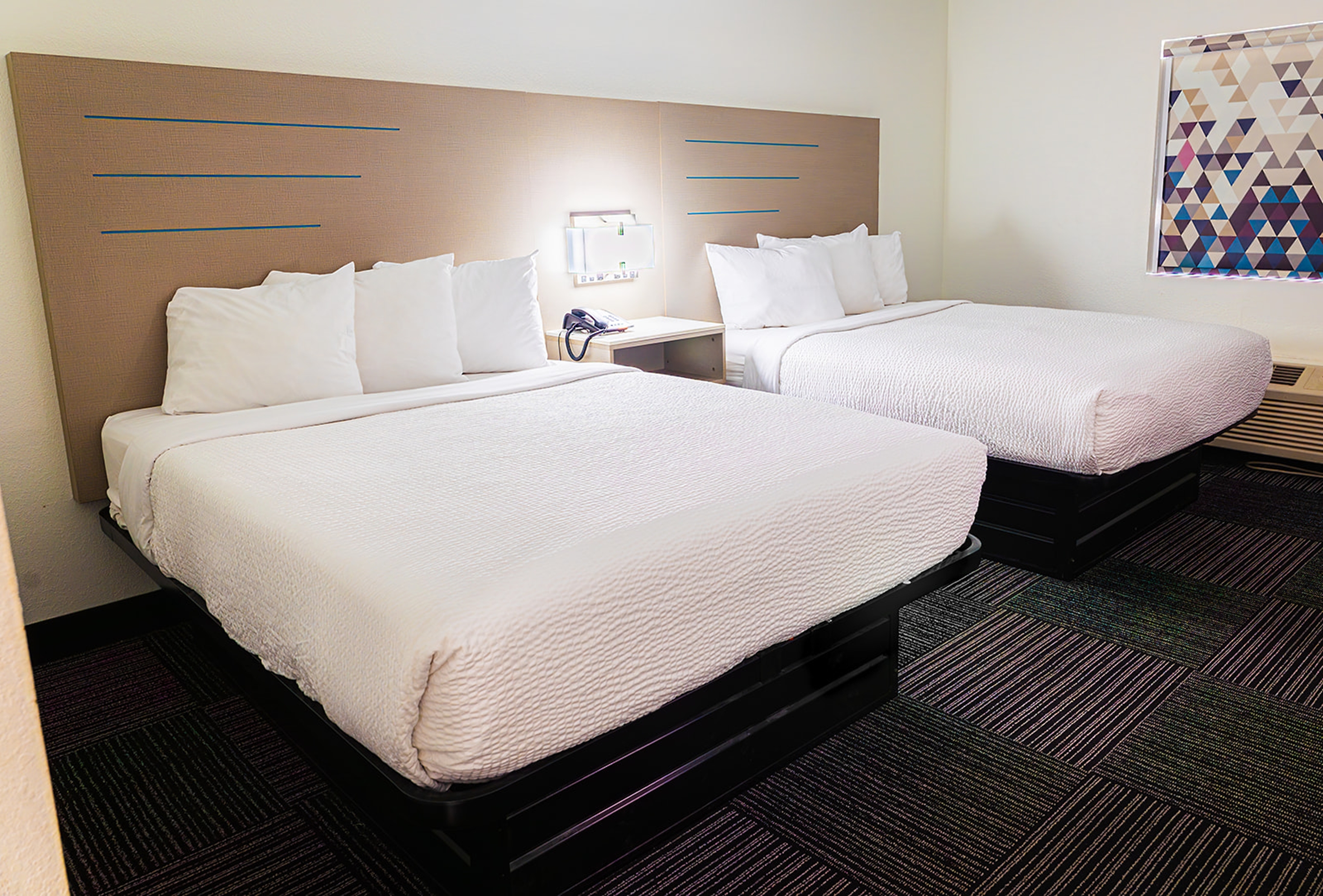 Guest room at the Baymont by Wyndham Port Wentworth in Port Wentworth, Georgia