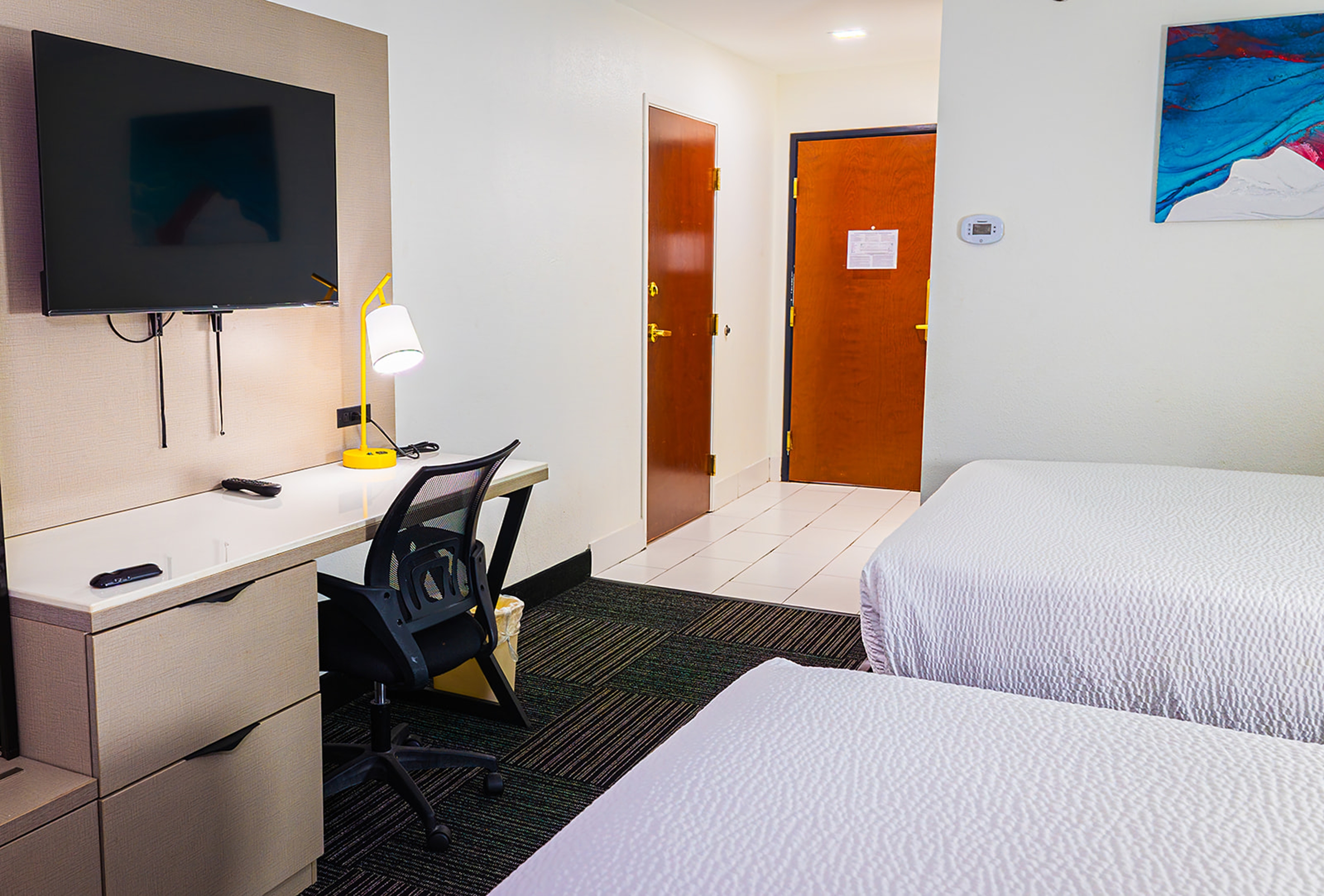 Guest room at the Baymont by Wyndham Port Wentworth in Port Wentworth, Georgia