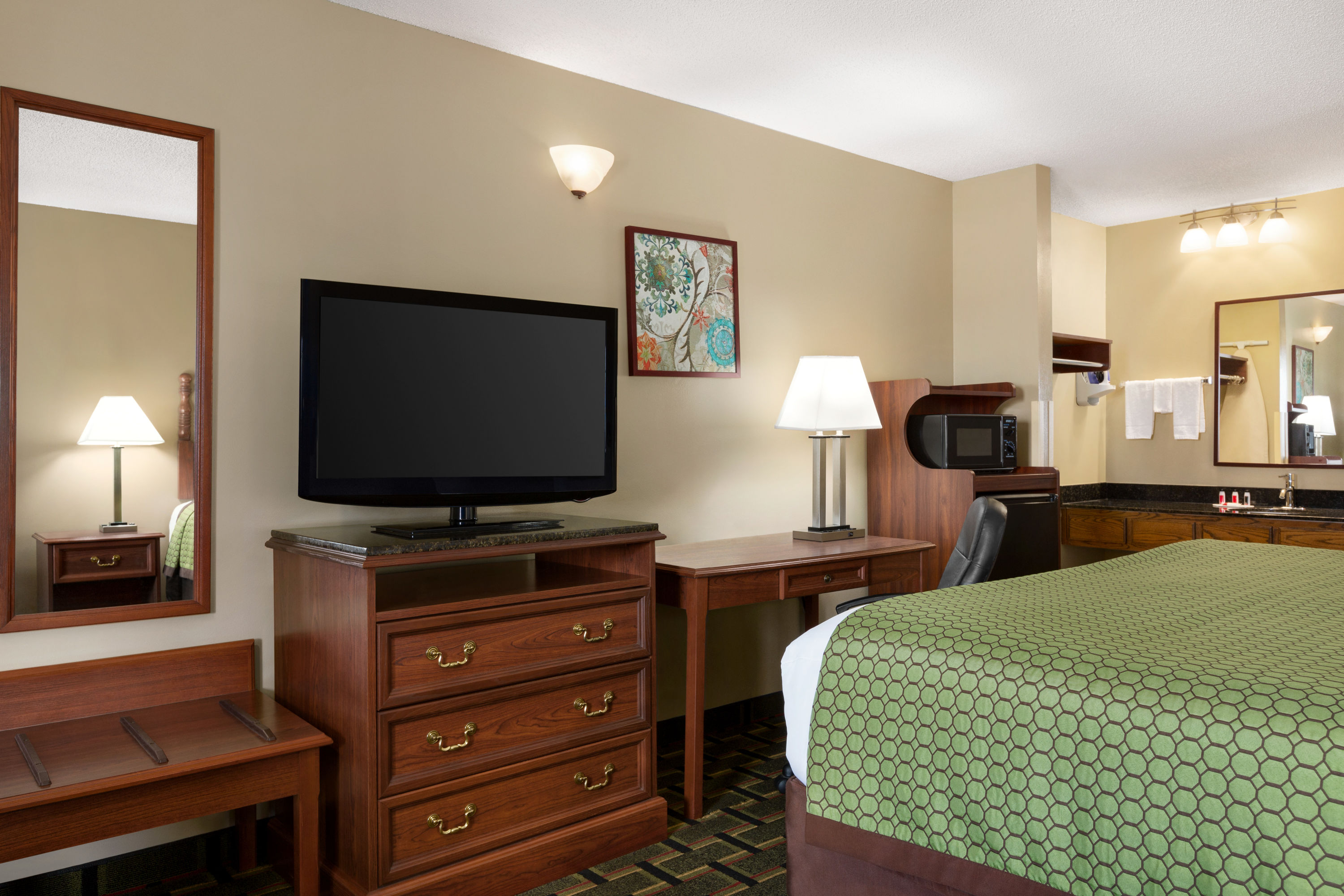 Guest room at the Baymont by Wyndham Warner Robins in Warner Robins, Georgia