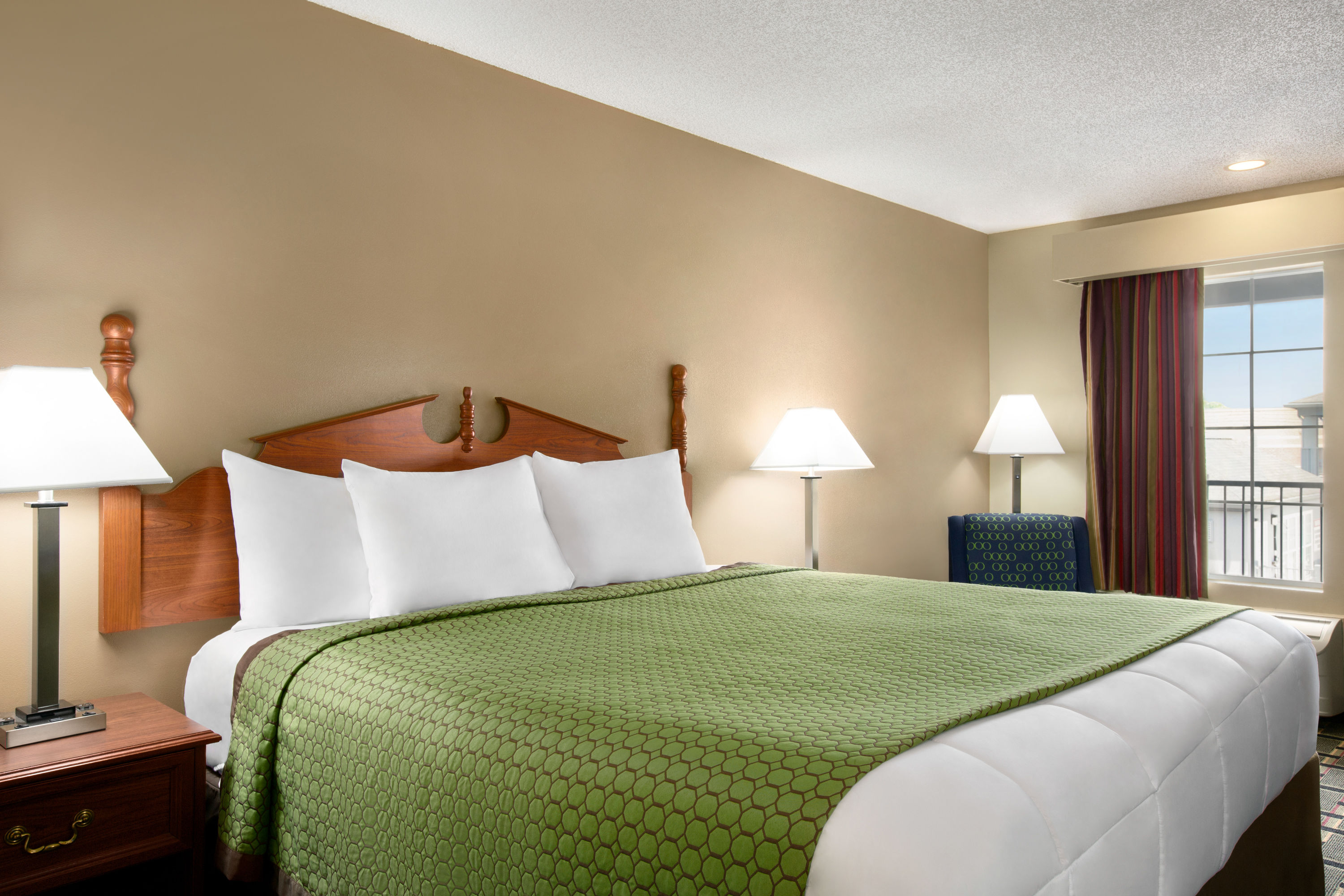 Guest room at the Baymont by Wyndham Warner Robins in Warner Robins, Georgia