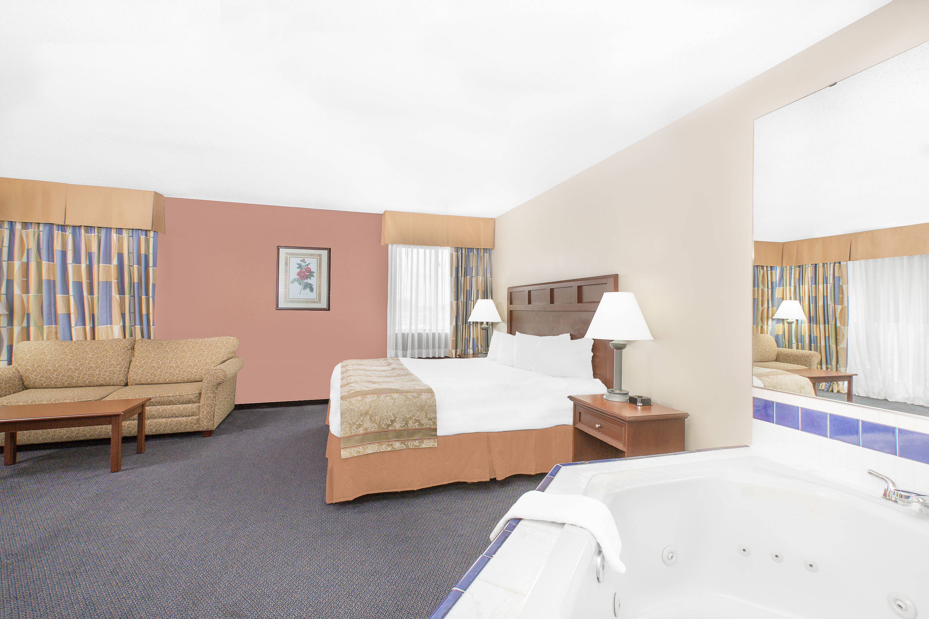 Guest room at the Baymont by Wyndham Boone in Boone, Iowa
