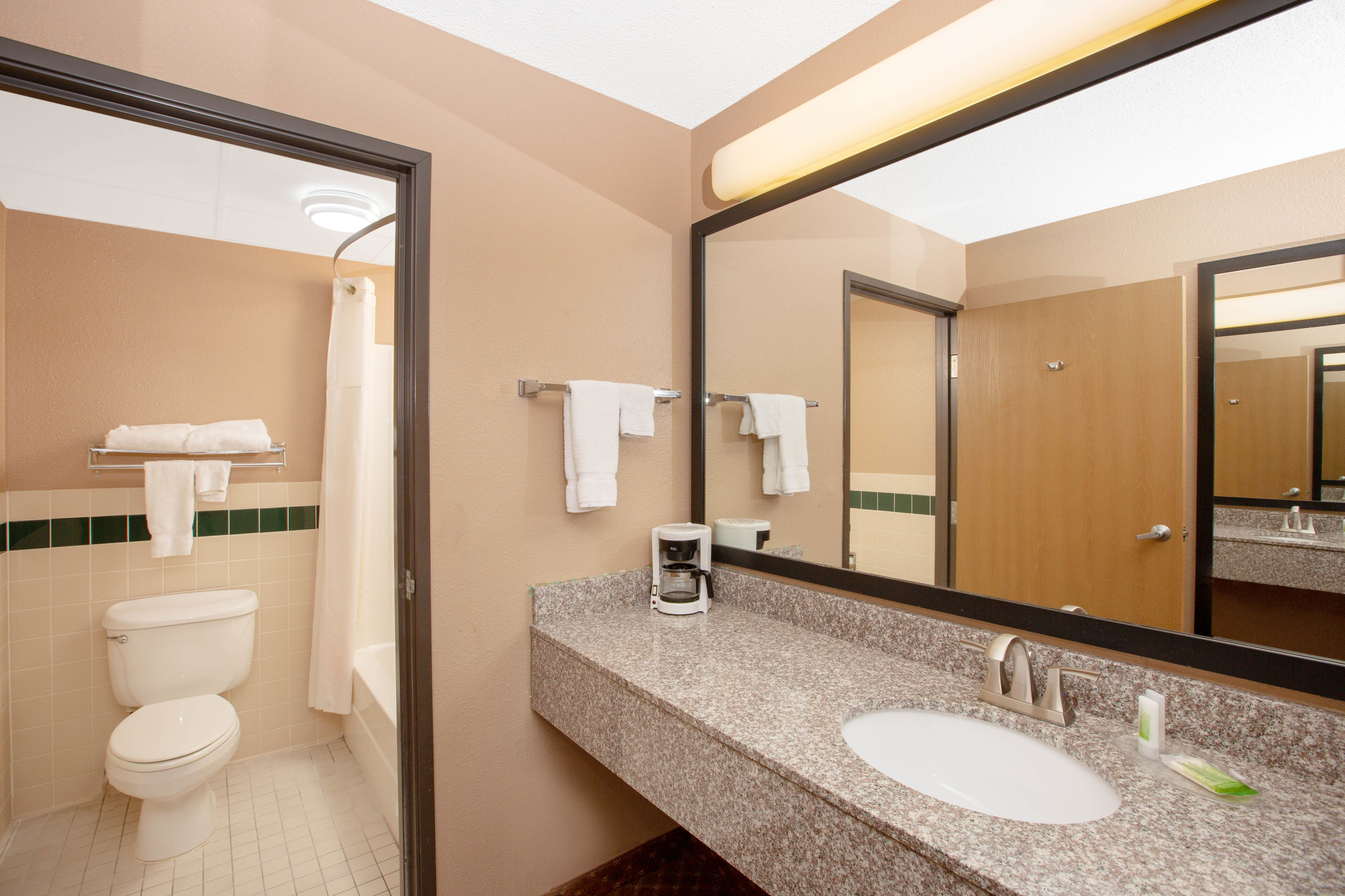 Guest room bath at the Baymont by Wyndham Coralville in Coralville, Iowa