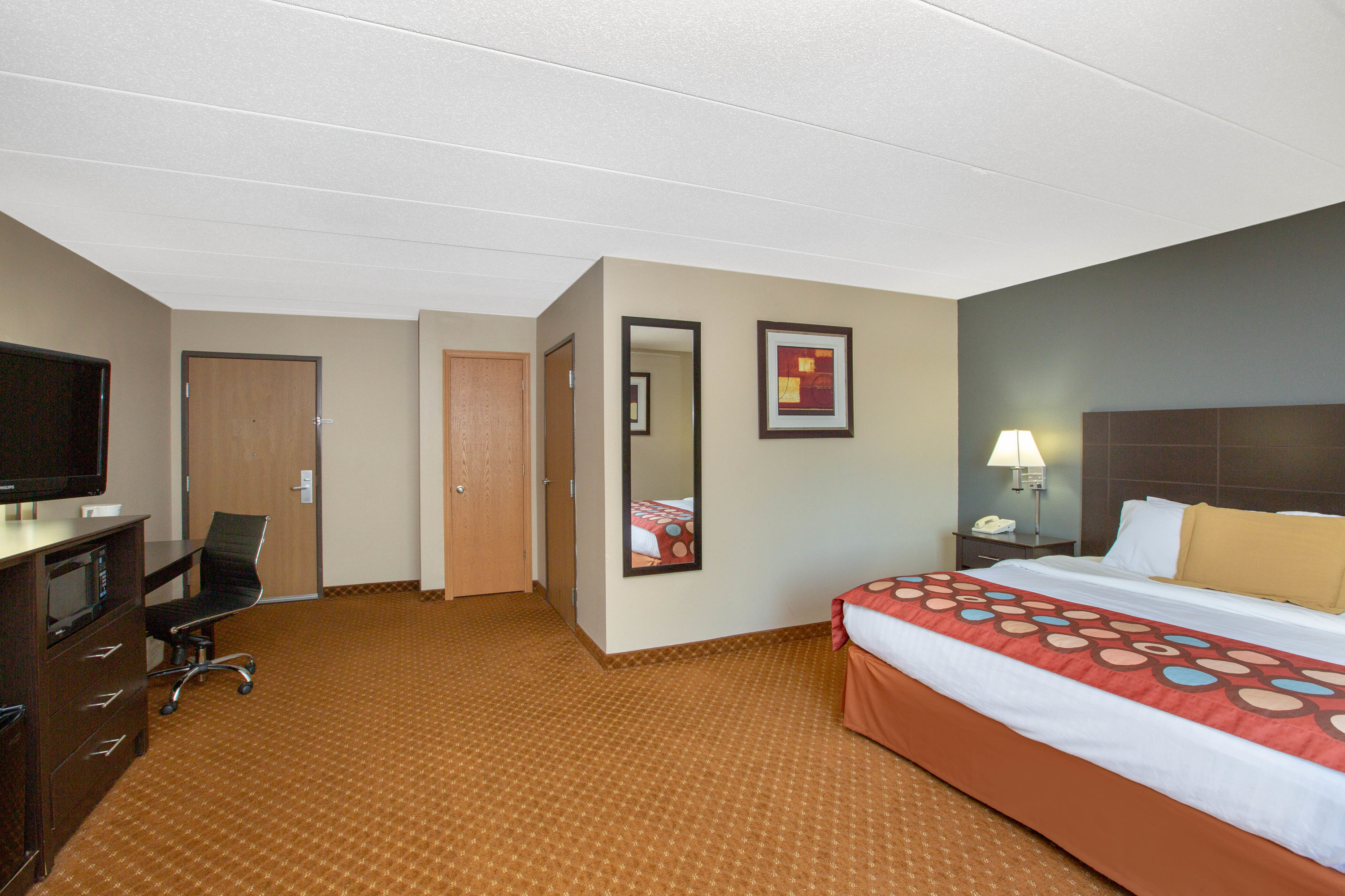 Guest room at the Baymont by Wyndham Coralville in Coralville, Iowa