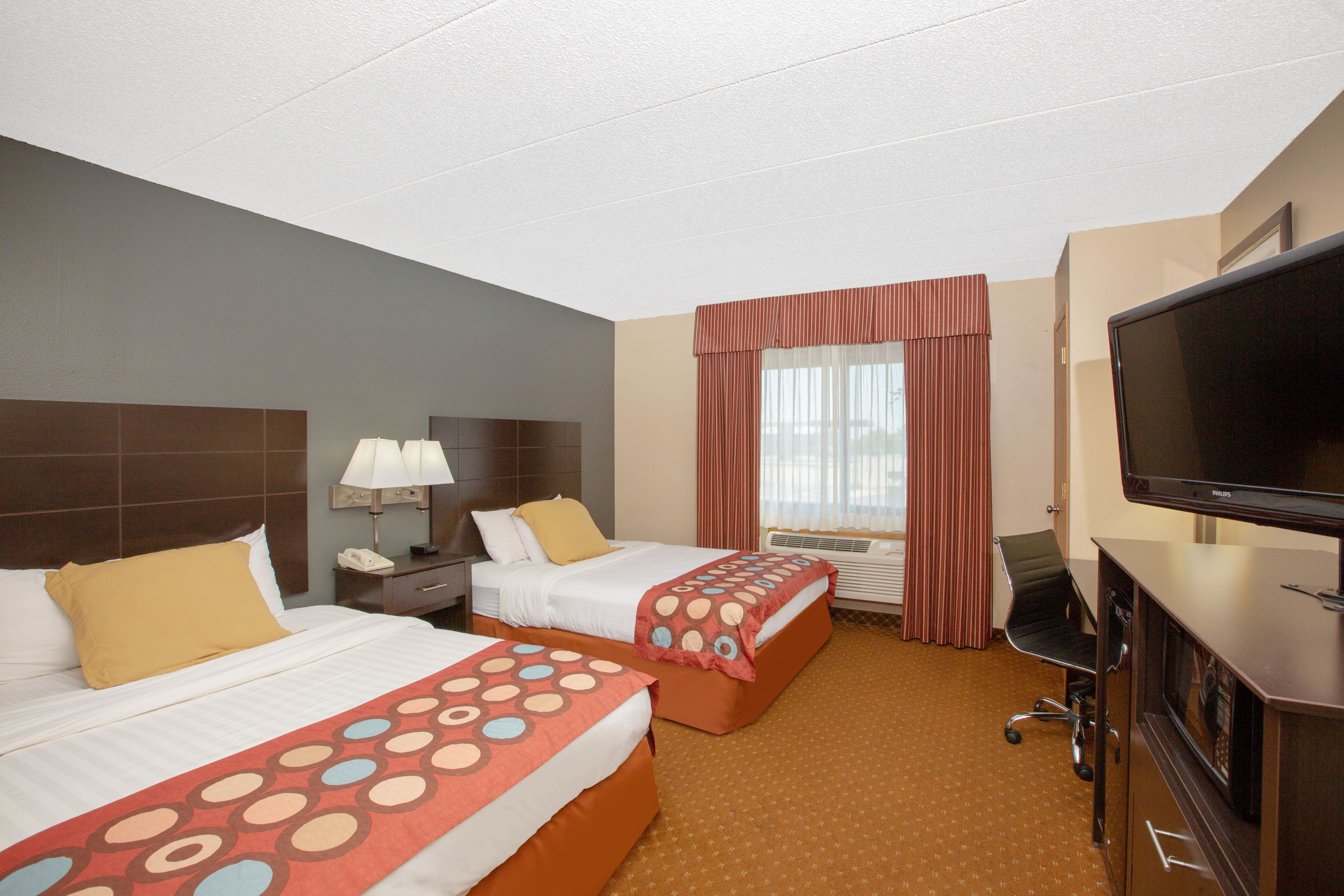 Guest room at the Baymont by Wyndham Coralville in Coralville, Iowa