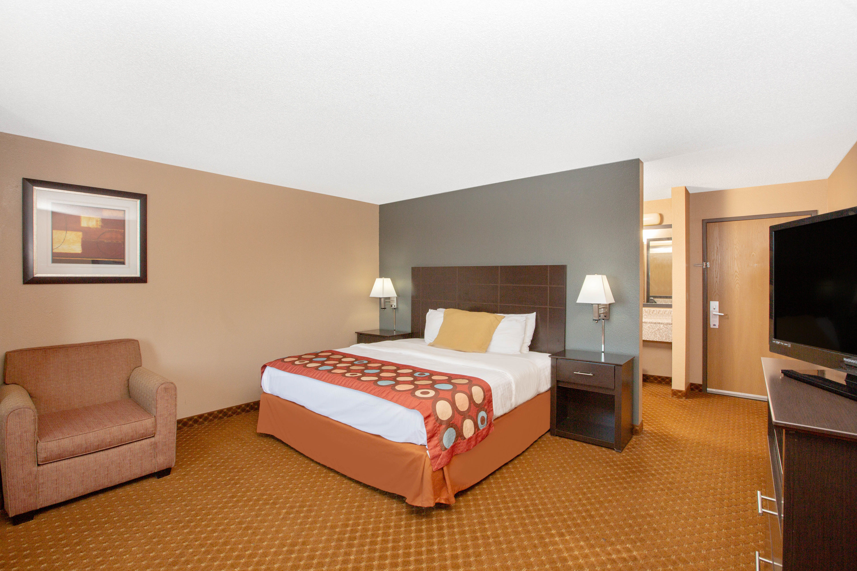 Guest room at the Baymont by Wyndham Coralville in Coralville, Iowa