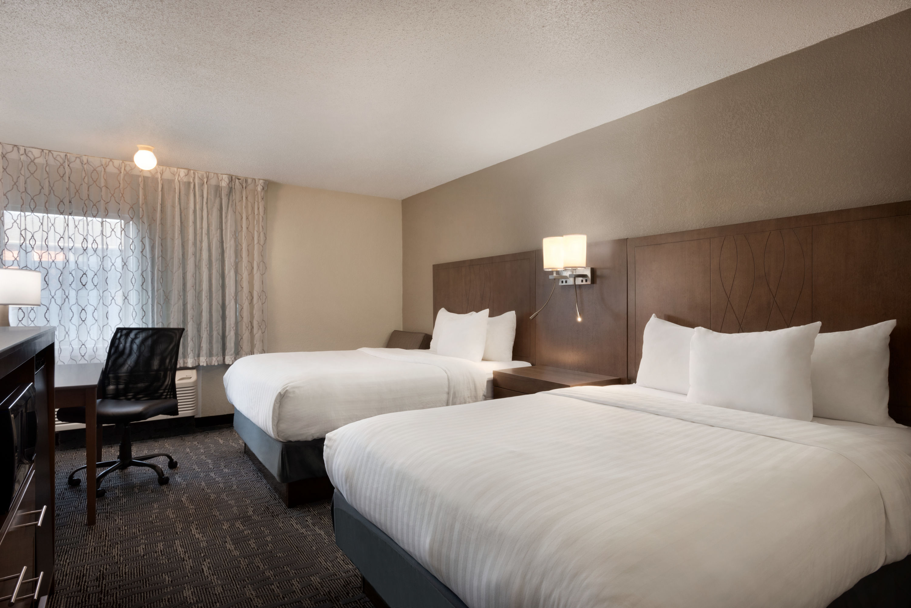 Guest room at the Baymont by Wyndham Des Moines North in Des Moines, Iowa