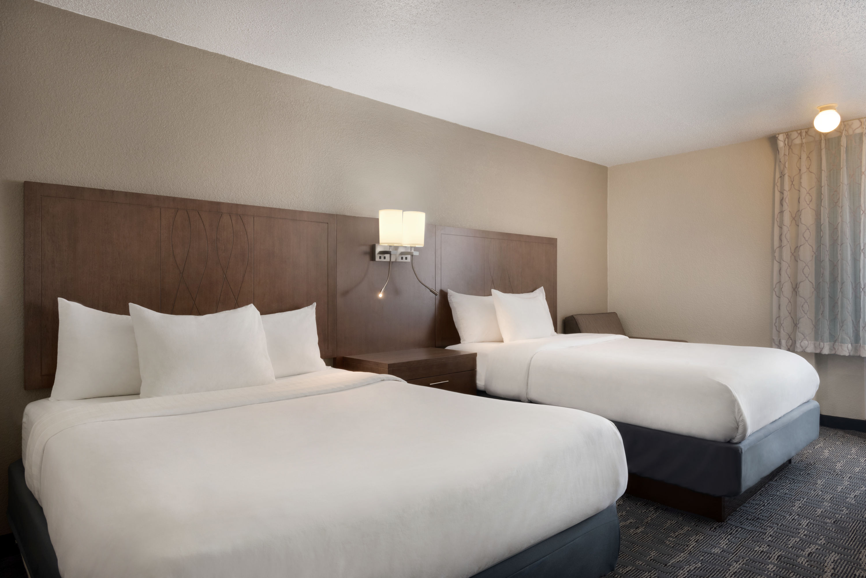 Guest room at the Baymont by Wyndham Des Moines North in Des Moines, Iowa