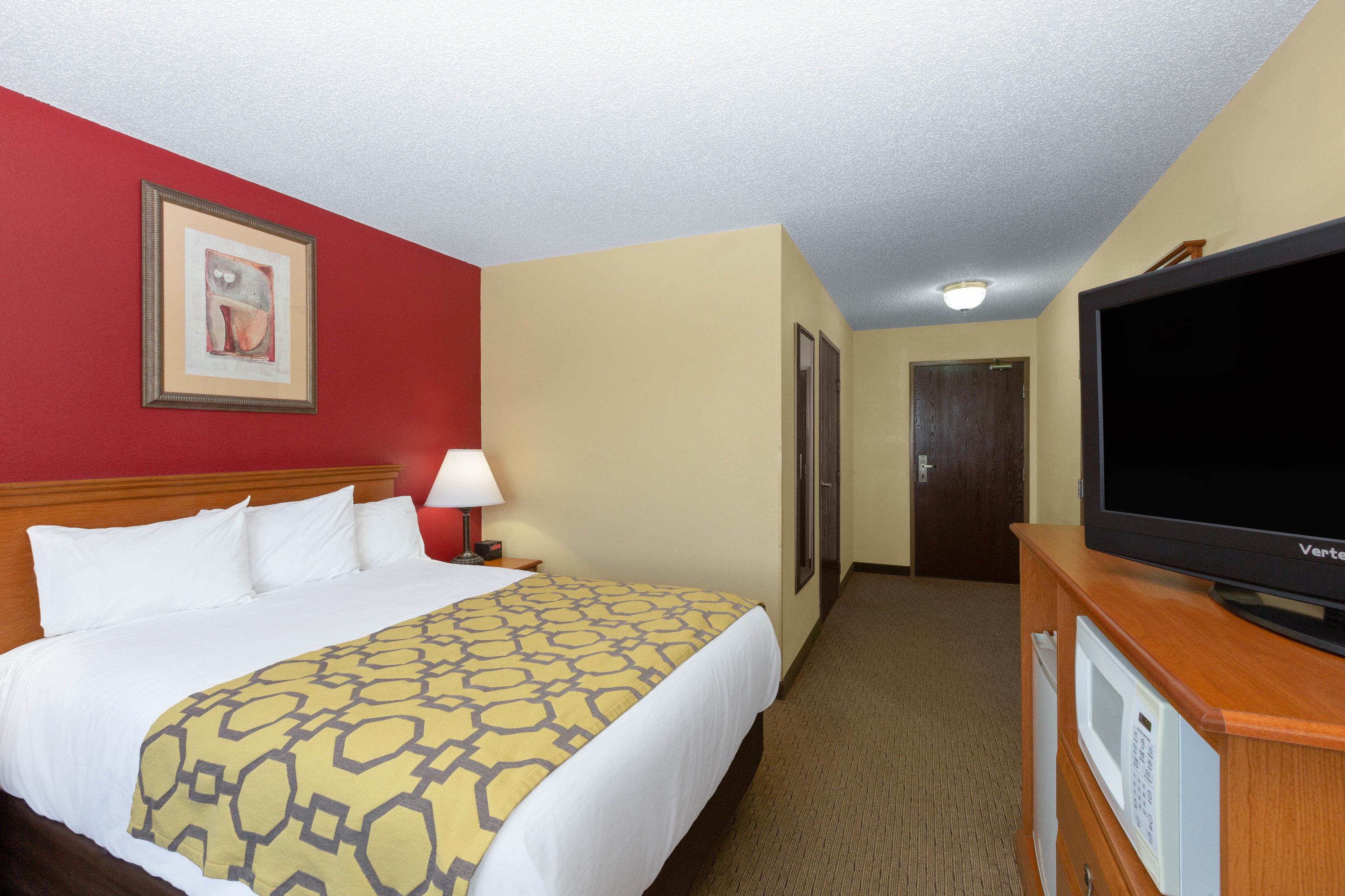 Guest room at the Baymont by Wyndham Fort Dodge in Fort Dodge, Iowa