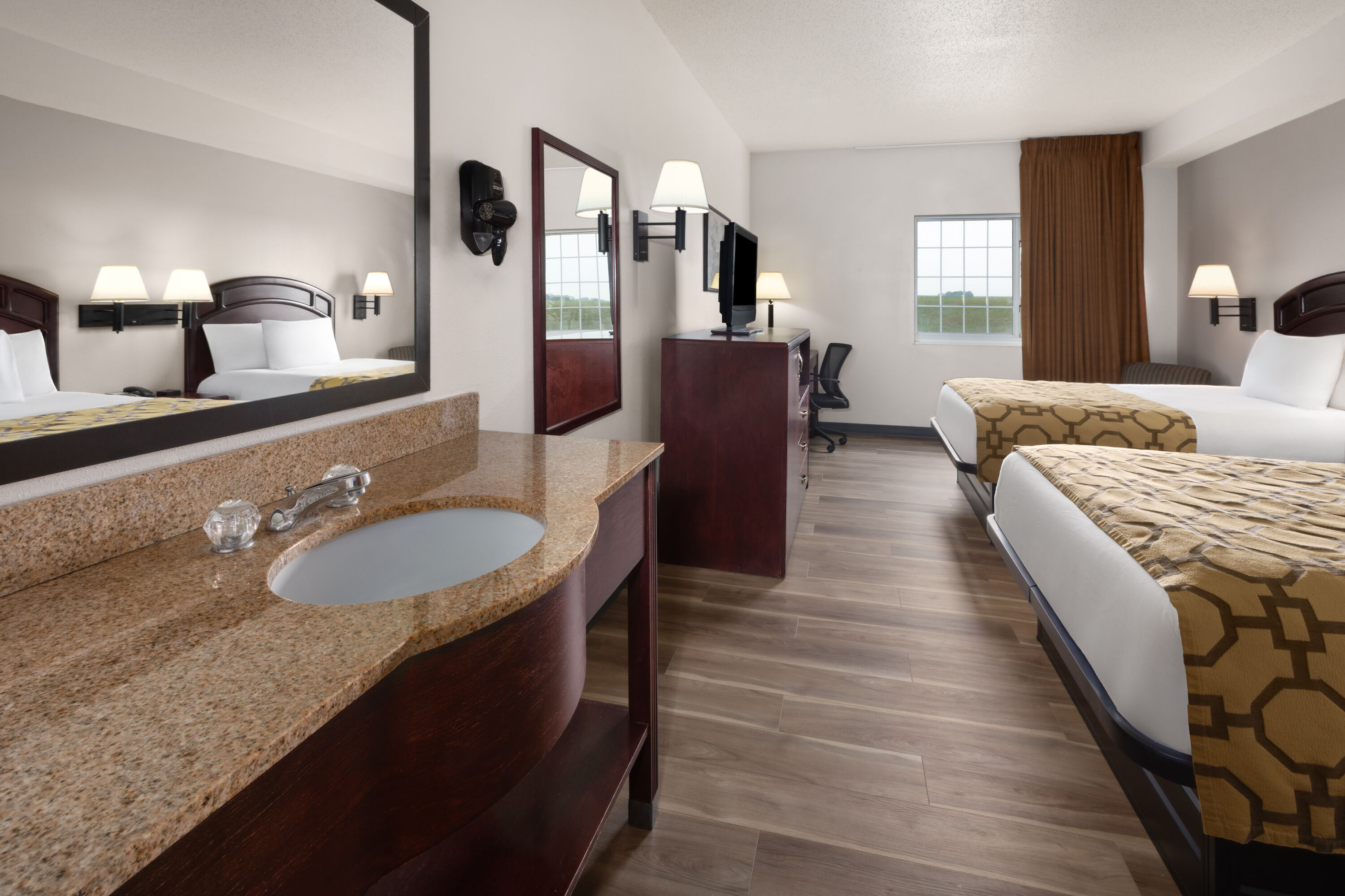 Guest room at the Baymont by Wyndham Harlan in Harlan, Iowa