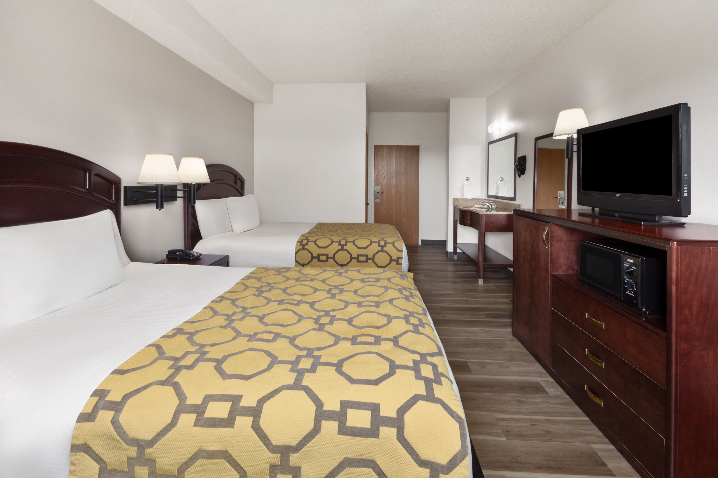 Guest room at the Baymont by Wyndham Harlan in Harlan, Iowa