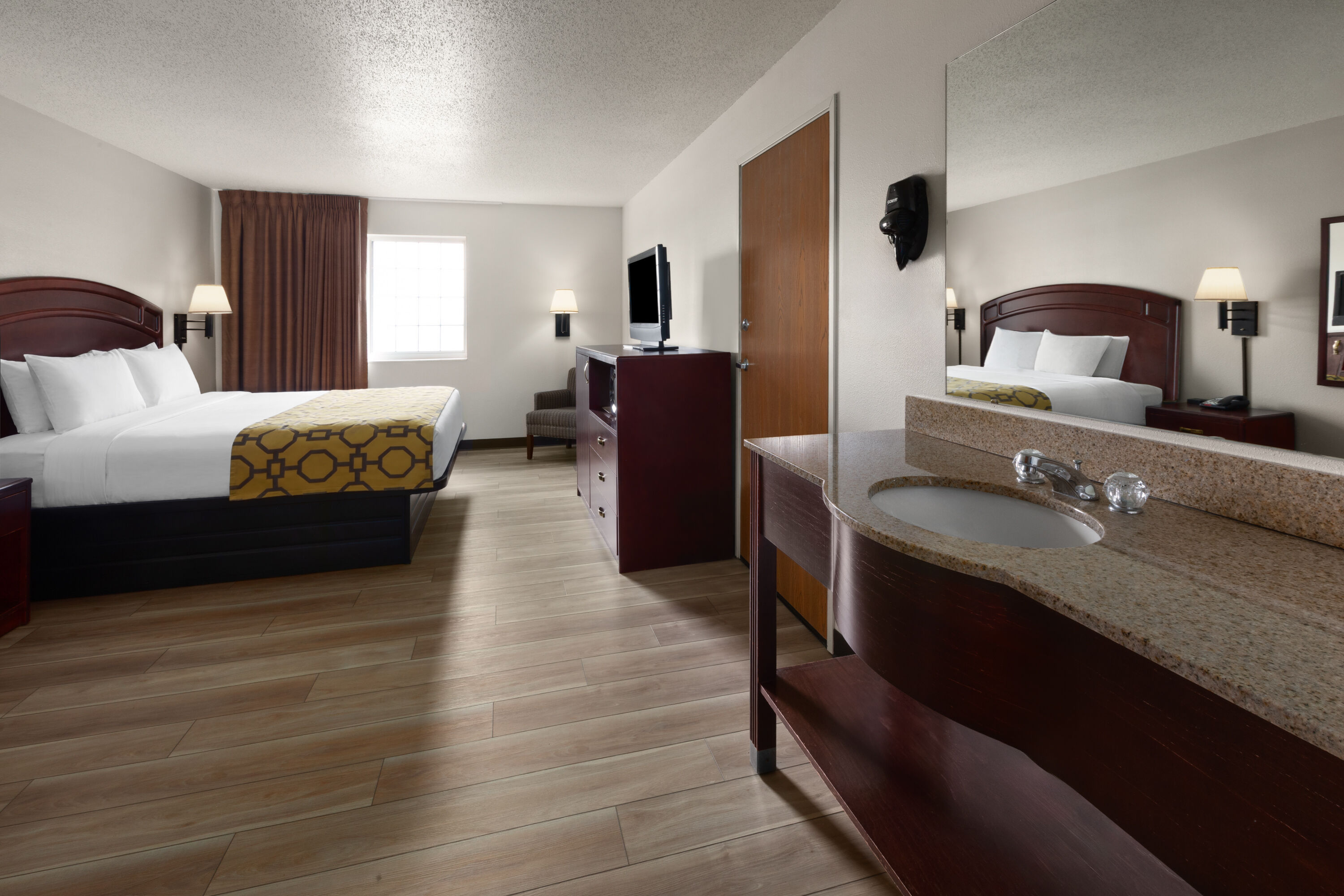 Guest room at the Baymont by Wyndham Harlan in Harlan, Iowa