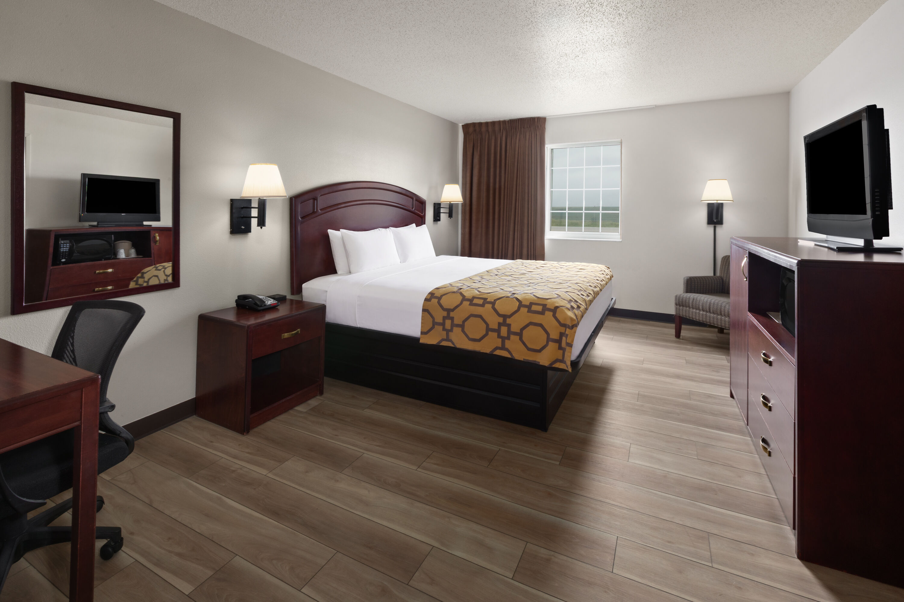 Guest room at the Baymont by Wyndham Harlan in Harlan, Iowa