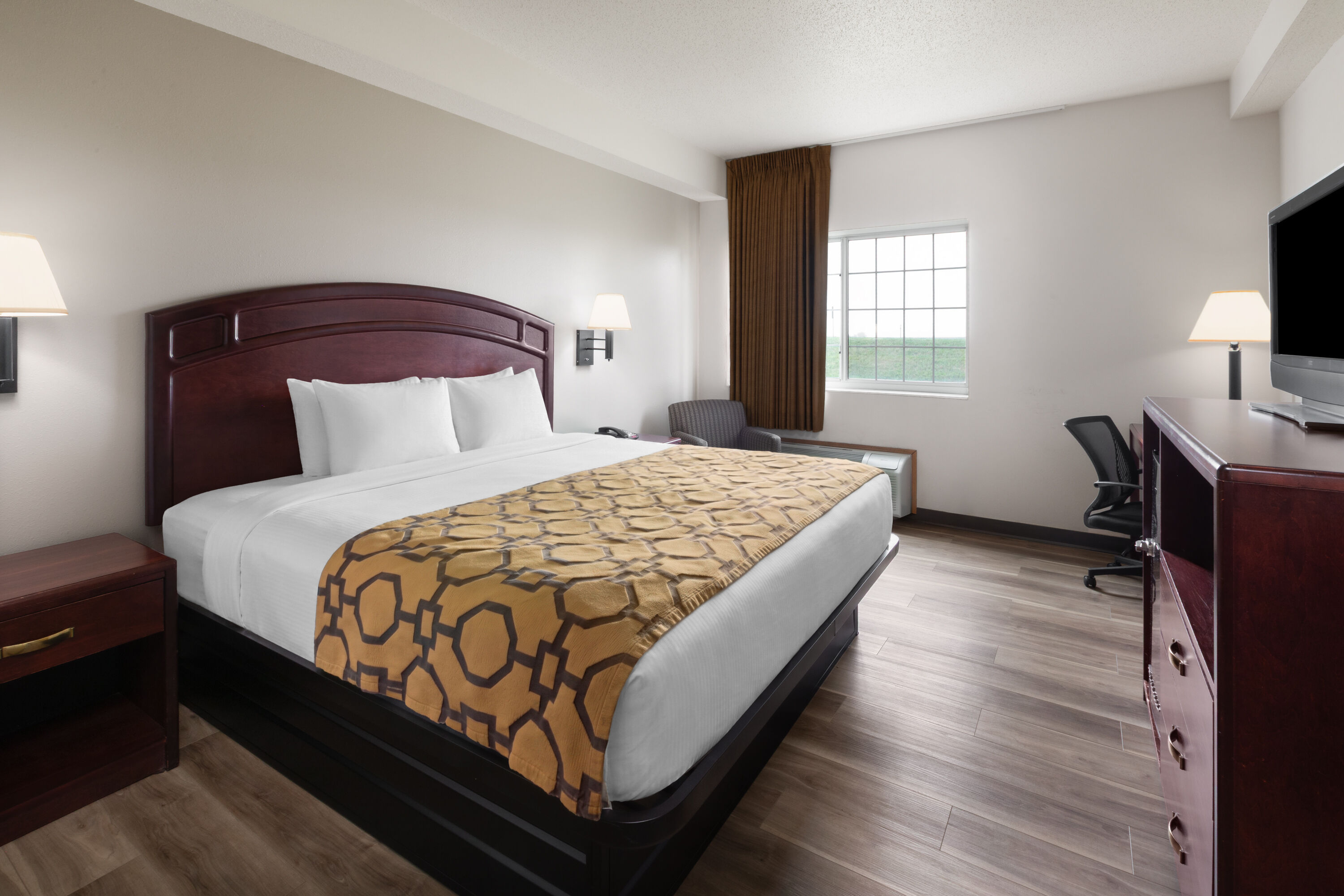 Guest room at the Baymont by Wyndham Harlan in Harlan, Iowa