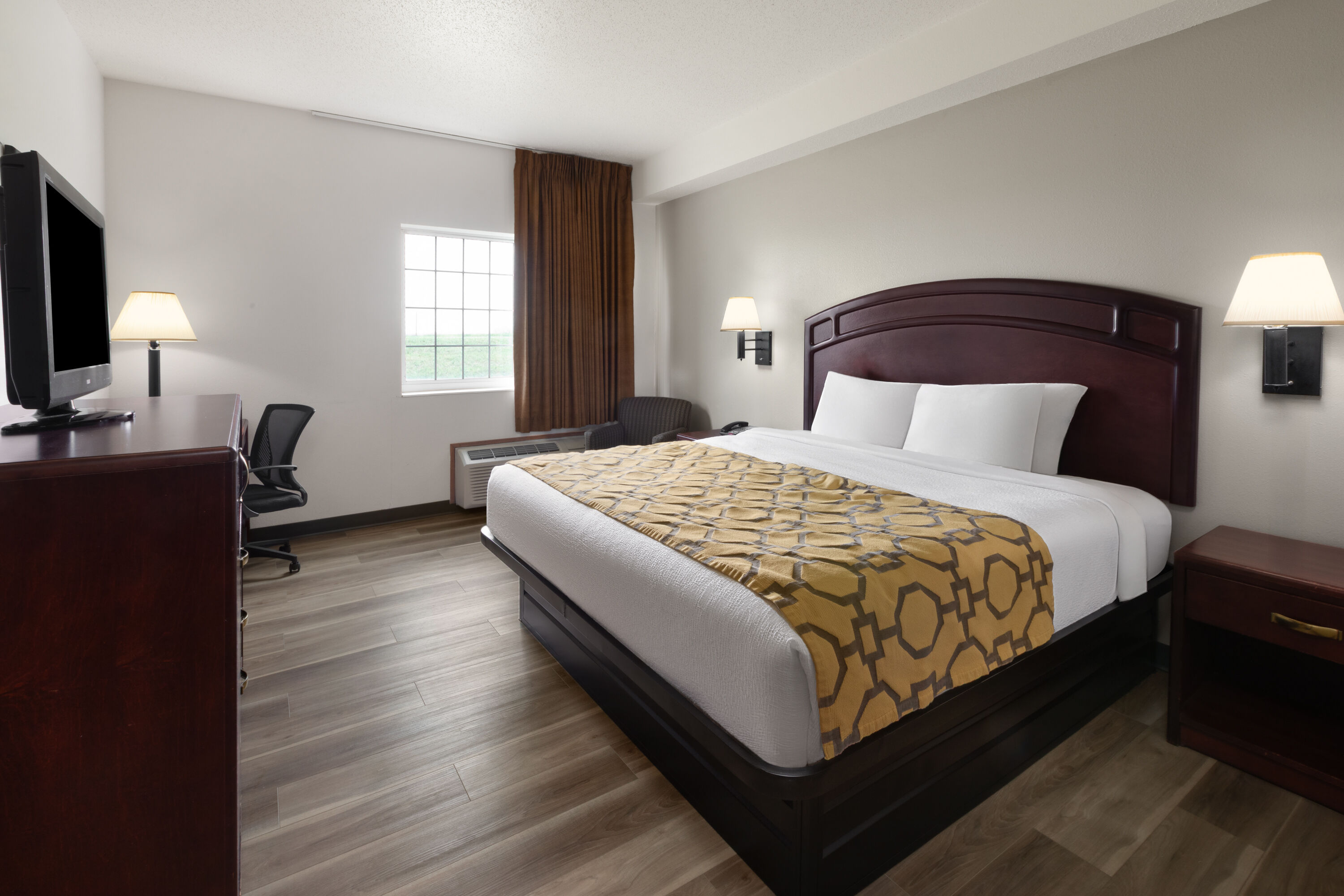 Guest room at the Baymont by Wyndham Harlan in Harlan, Iowa