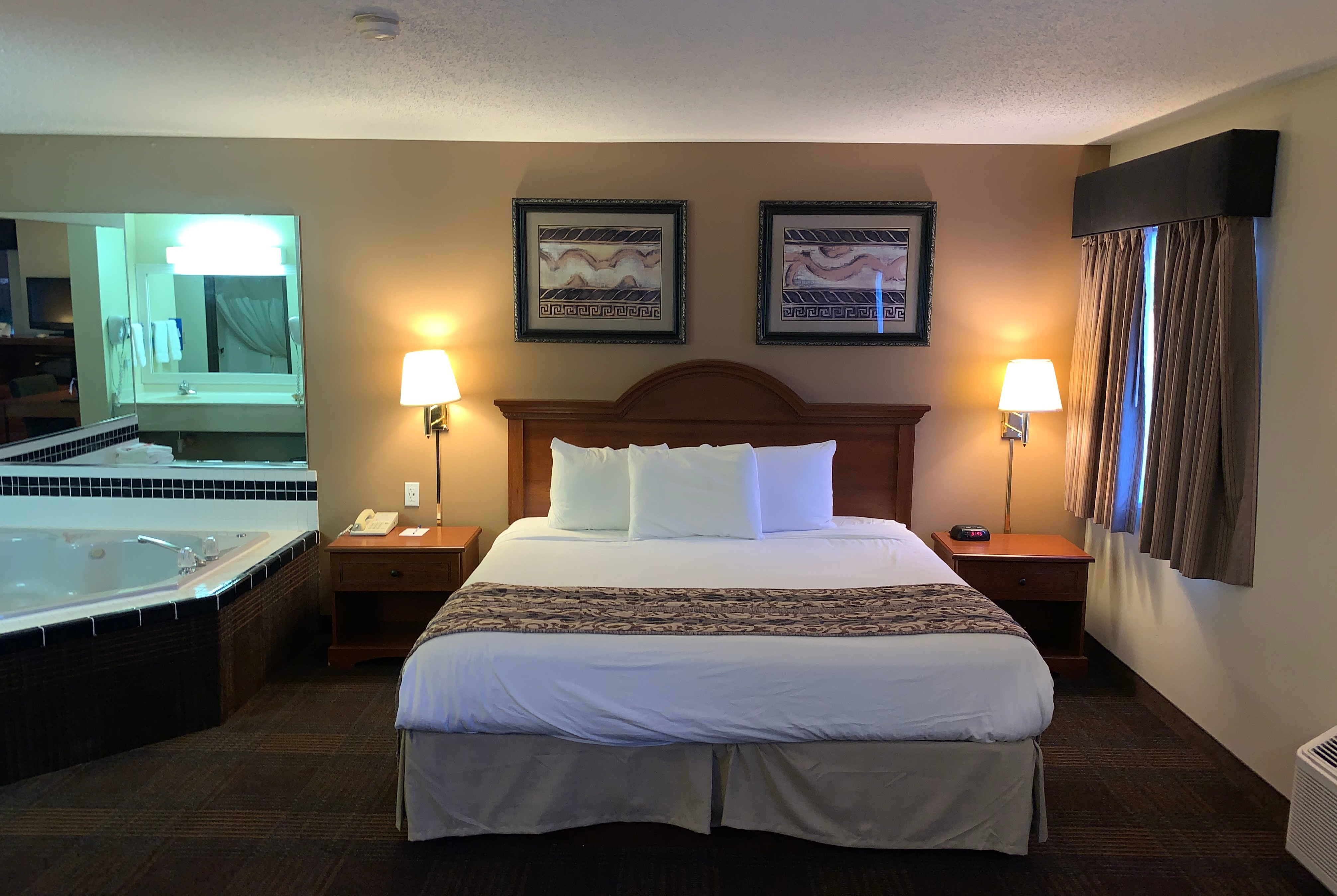 Guest room at the Baymont by Wyndham LeMars in Le Mars, Iowa