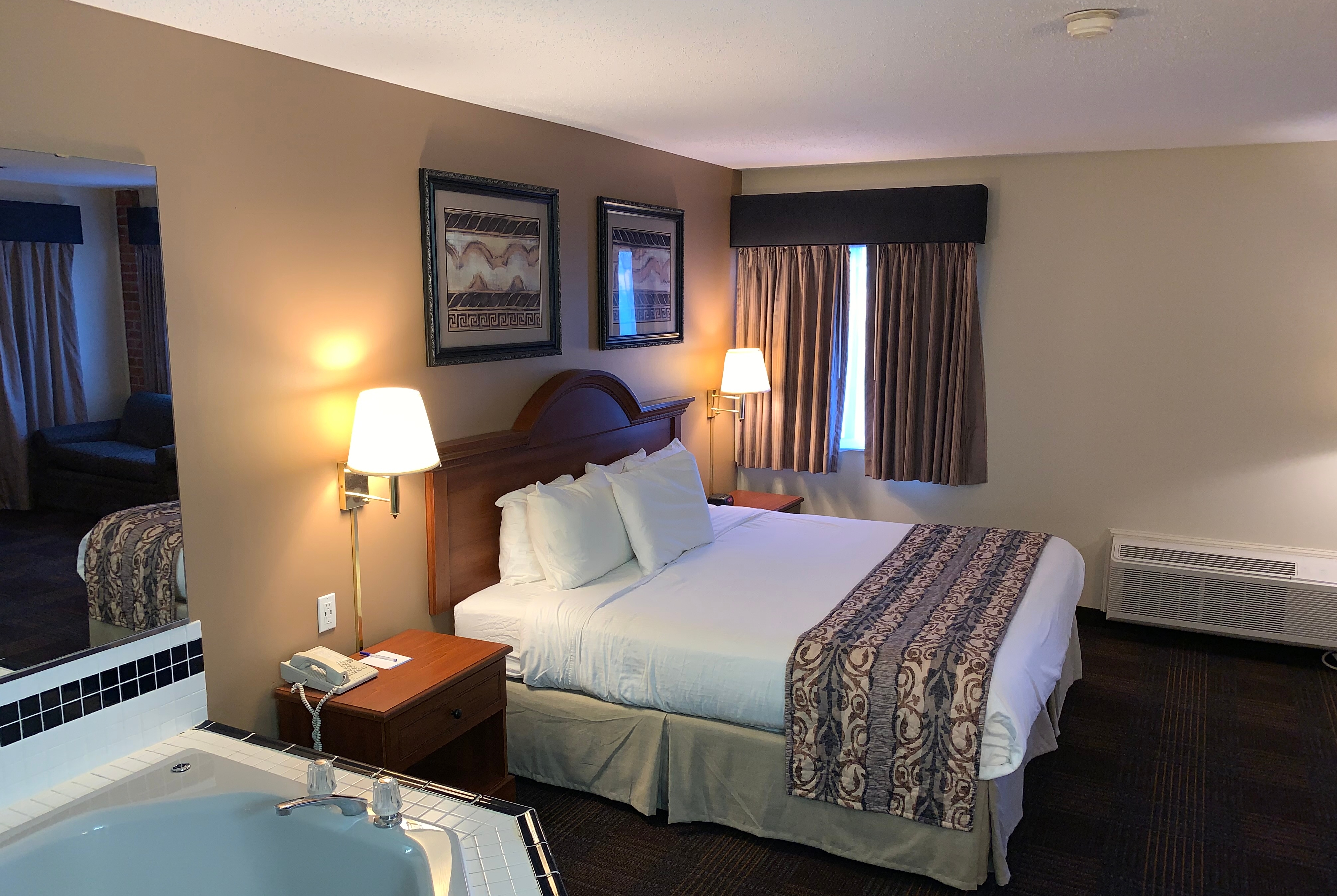 Guest room at the Baymont by Wyndham LeMars in Le Mars, Iowa