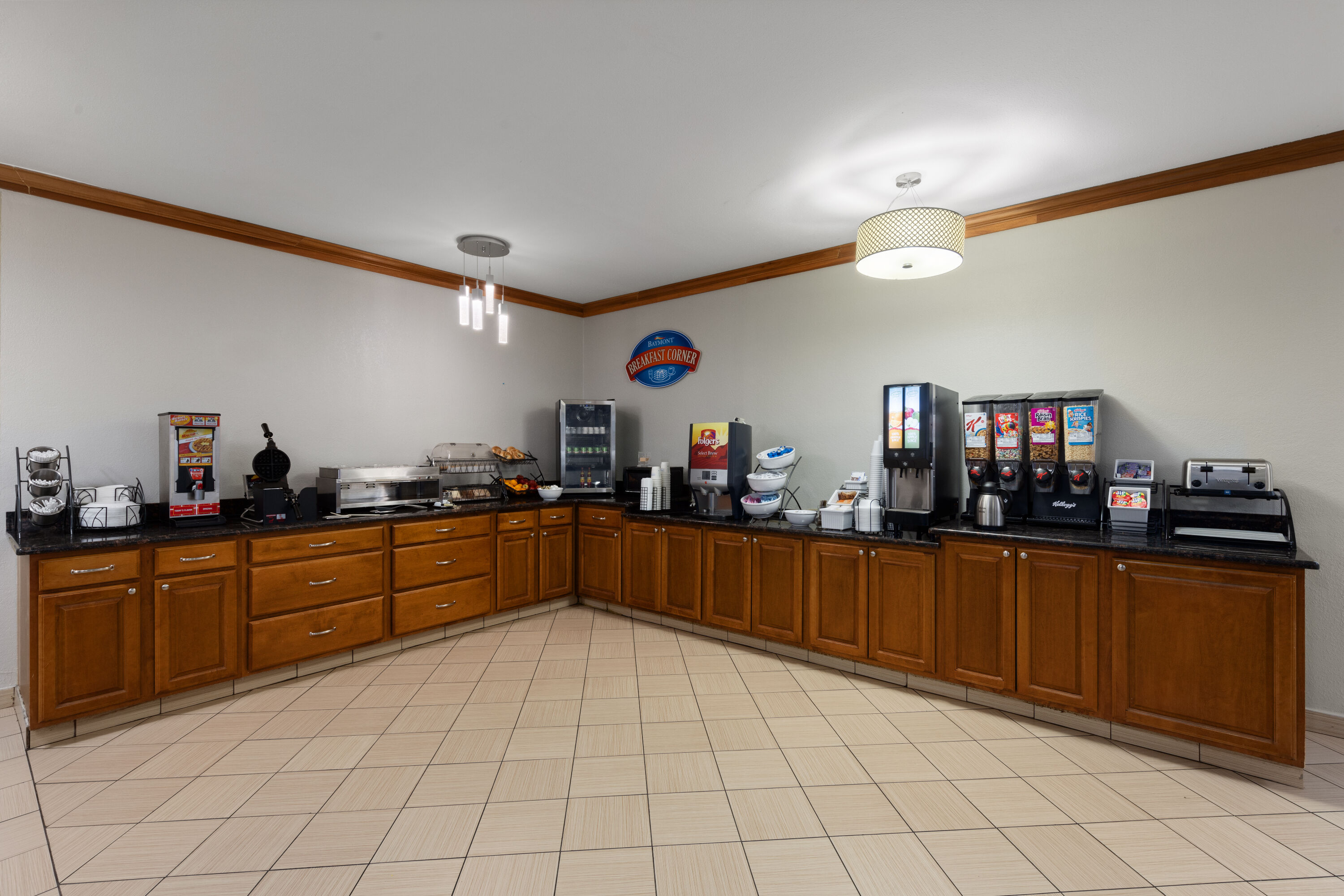Baymont by Wyndham Waterloo restaurant breakfast area with seating in Waterloo, Iowa